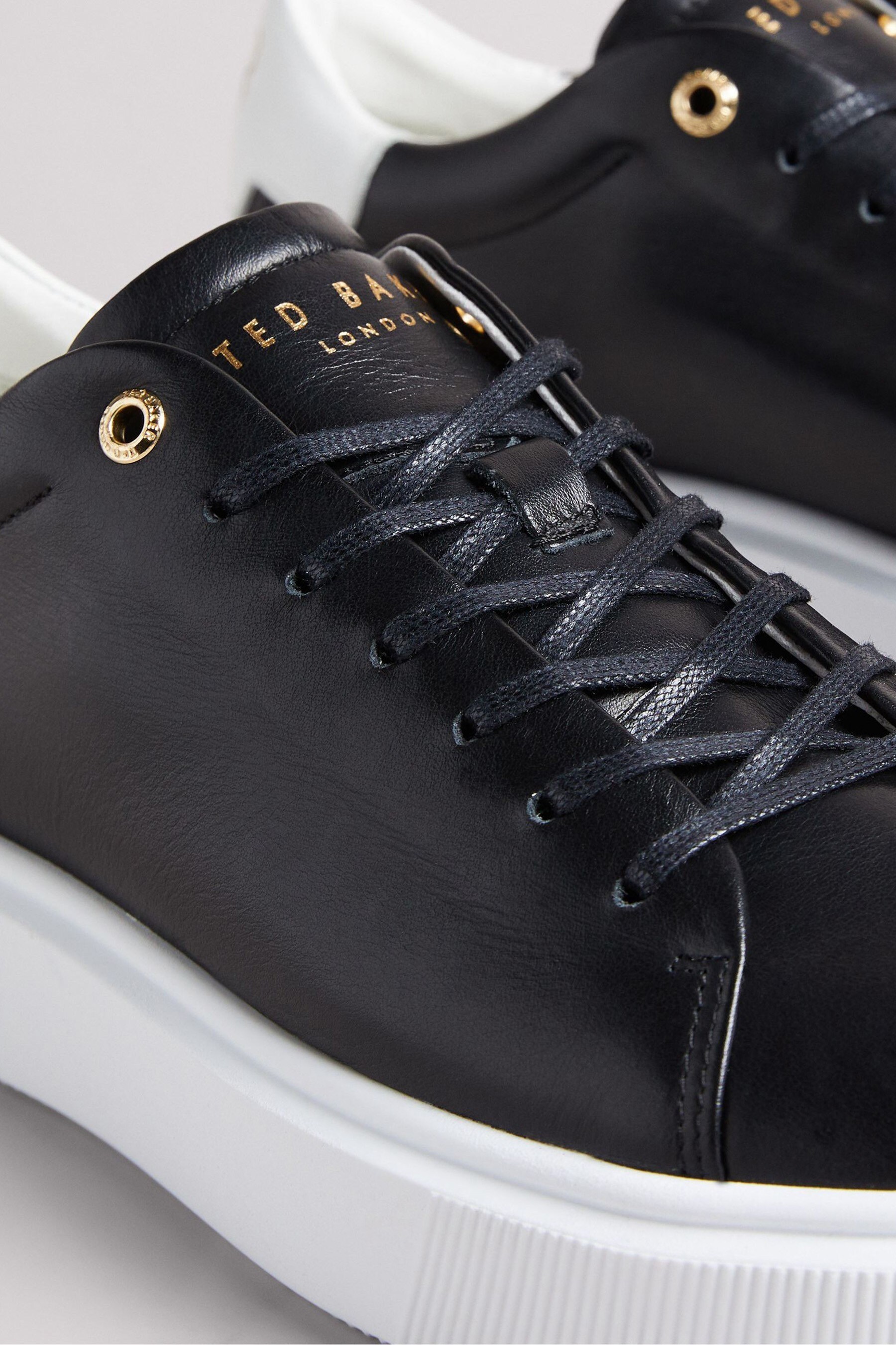 Buy Ted Baker Black Lornea Magnolia Flower Platform Trainers from Next Luxembourg