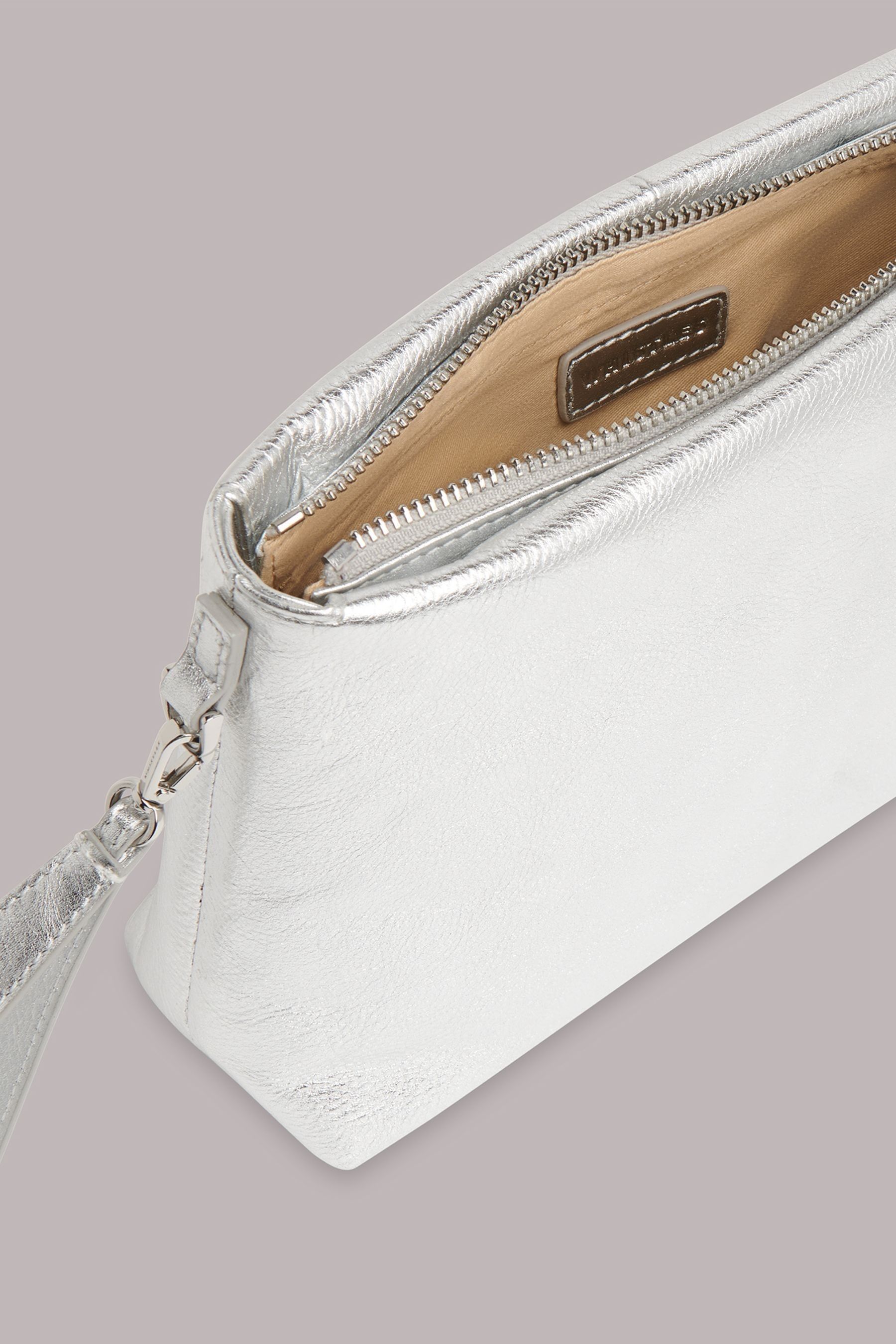 Kaufe Sie Silber Whistles Avah Clutch mit ReiBverschluss bei Next Deutschland