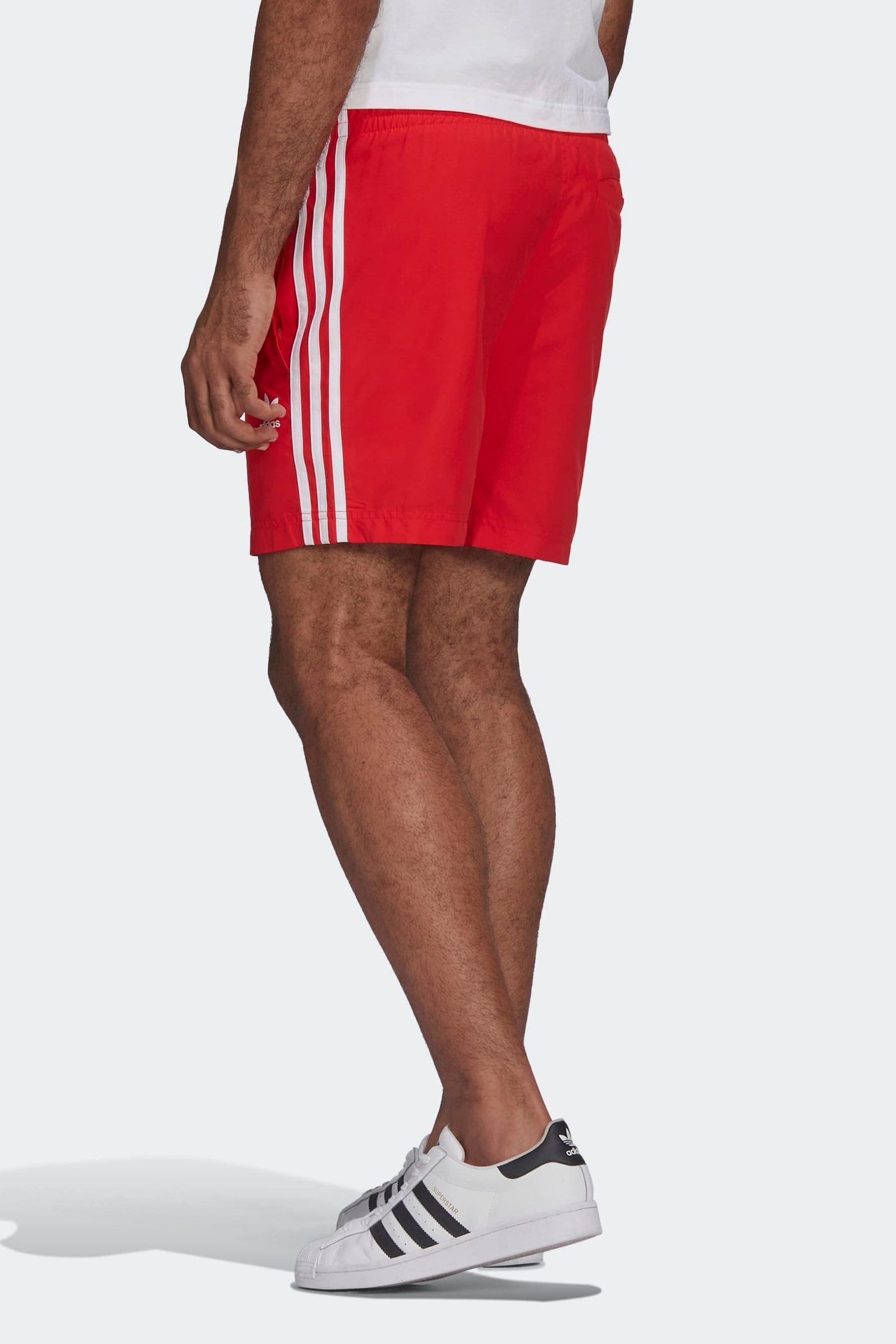 Buy adidas originals Mens Red Adicolor Classics 3 Stripes Swim Shorts from Next Luxembourg