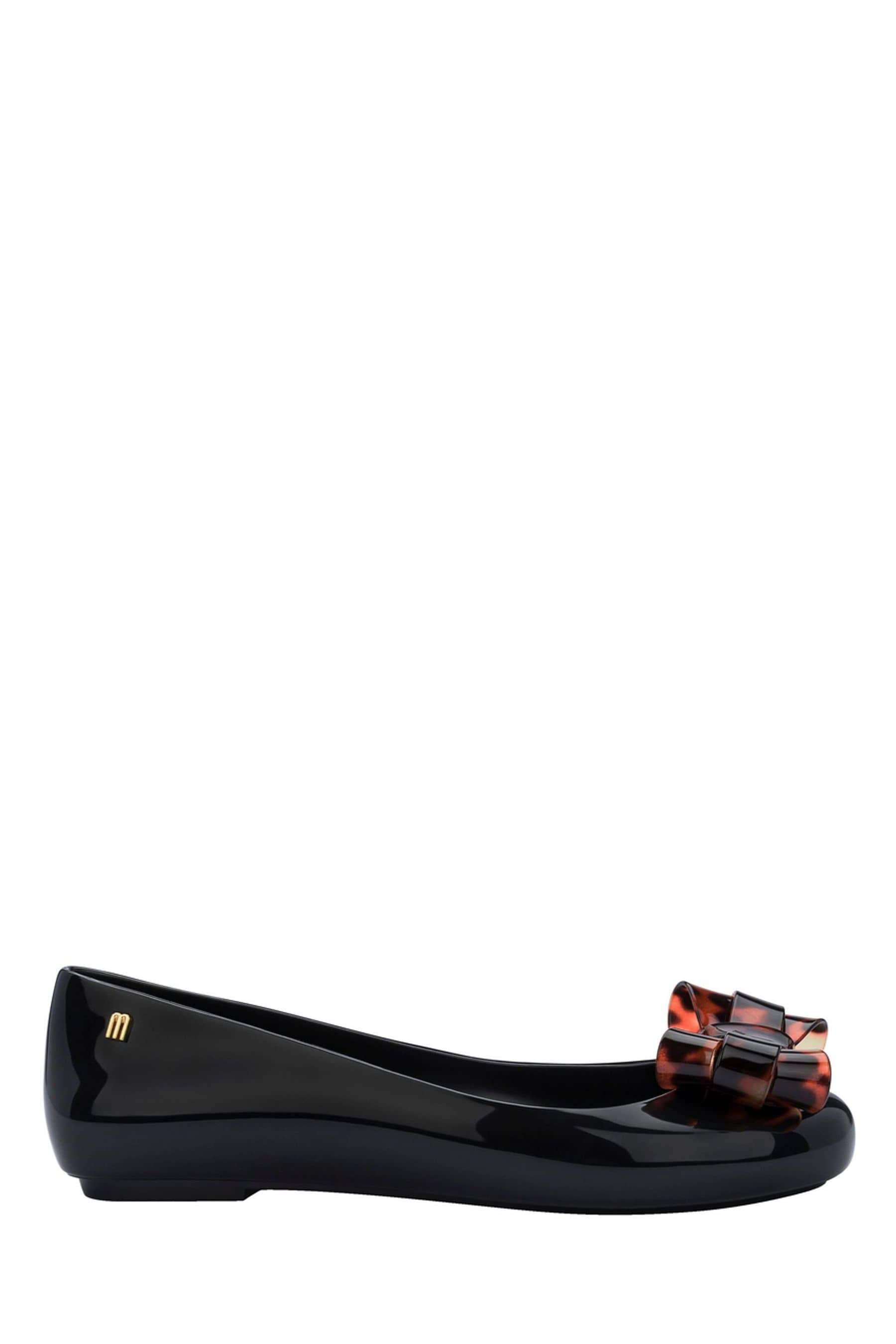 Buy Melissa Black Tortoiseshell Bow Pumps from Next Luxembourg