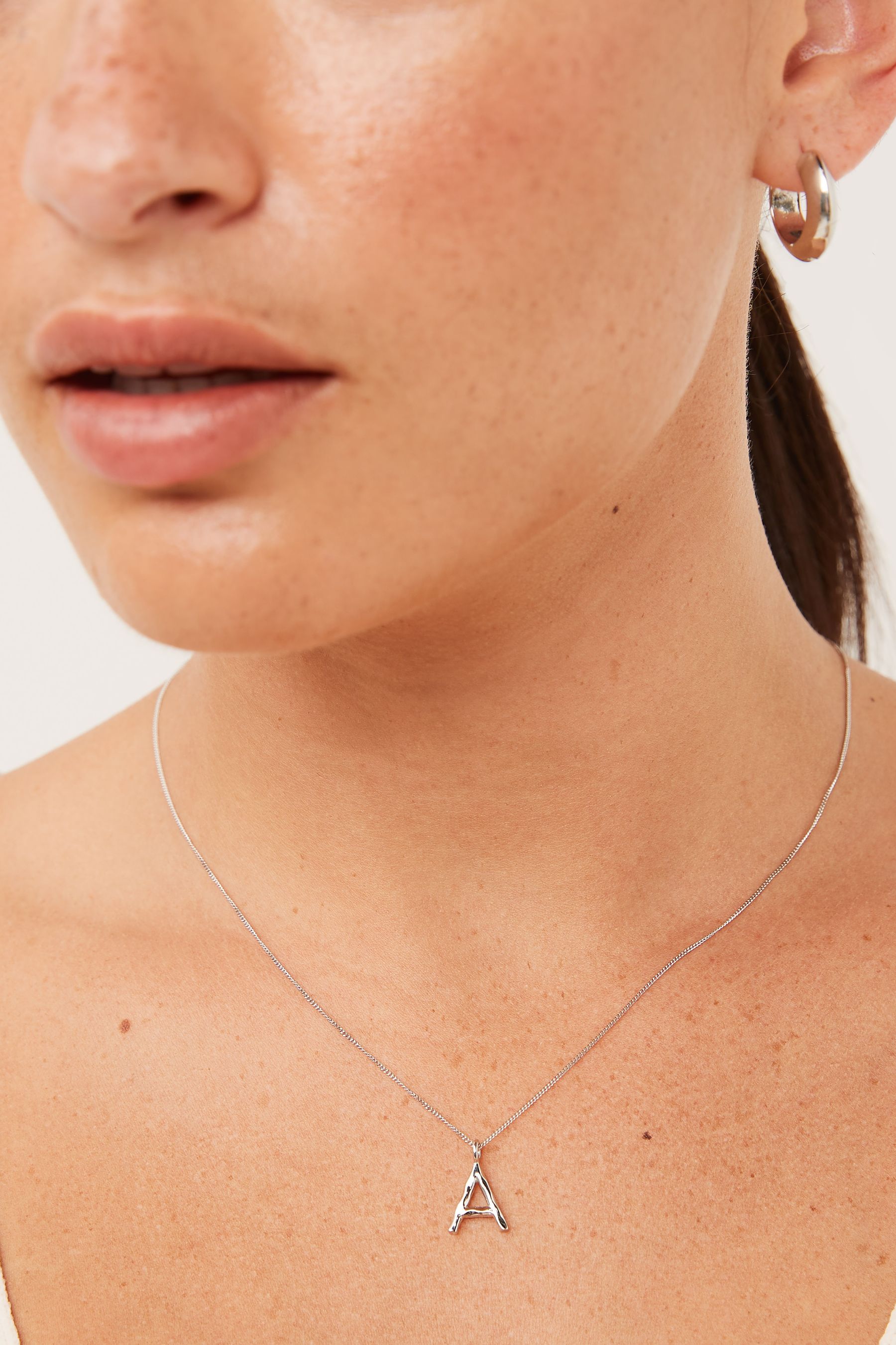 Buy Sterling Silver Molten Initial Necklace from Next Slovenia