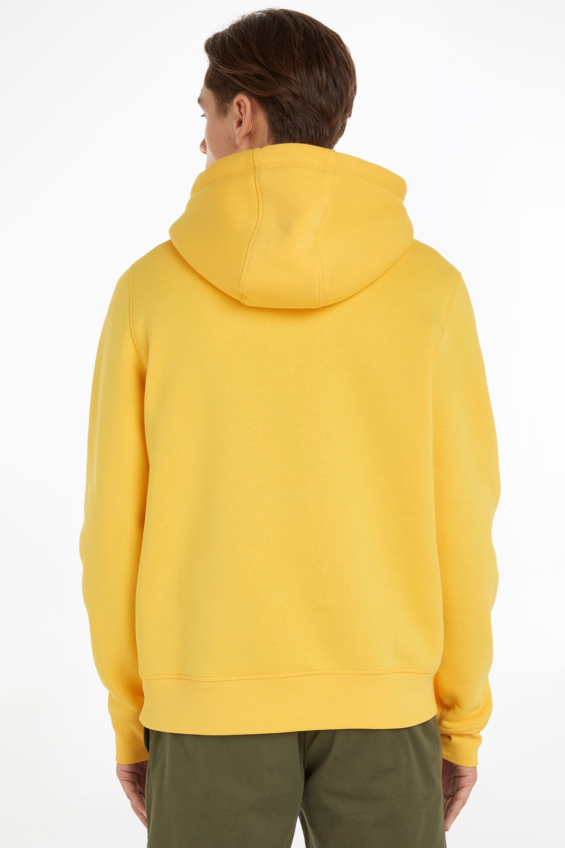Buy Tommy Hilfiger Yellow Logo Hoodie from Next Estonia