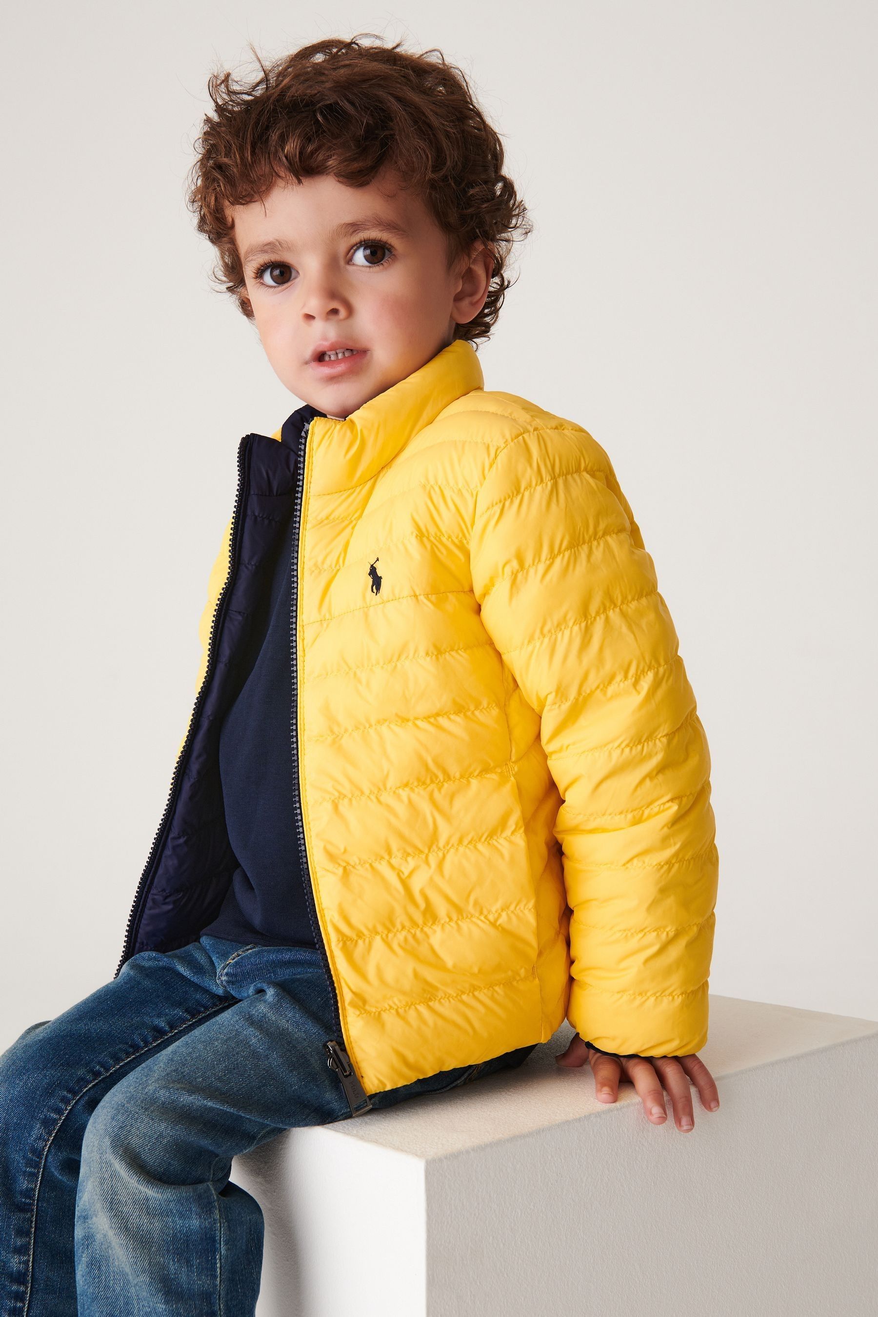 Buy Polo Ralph Lauren Navy Blue And Yellow Reversible Logo Puffer Jacket from Next Luxembourg