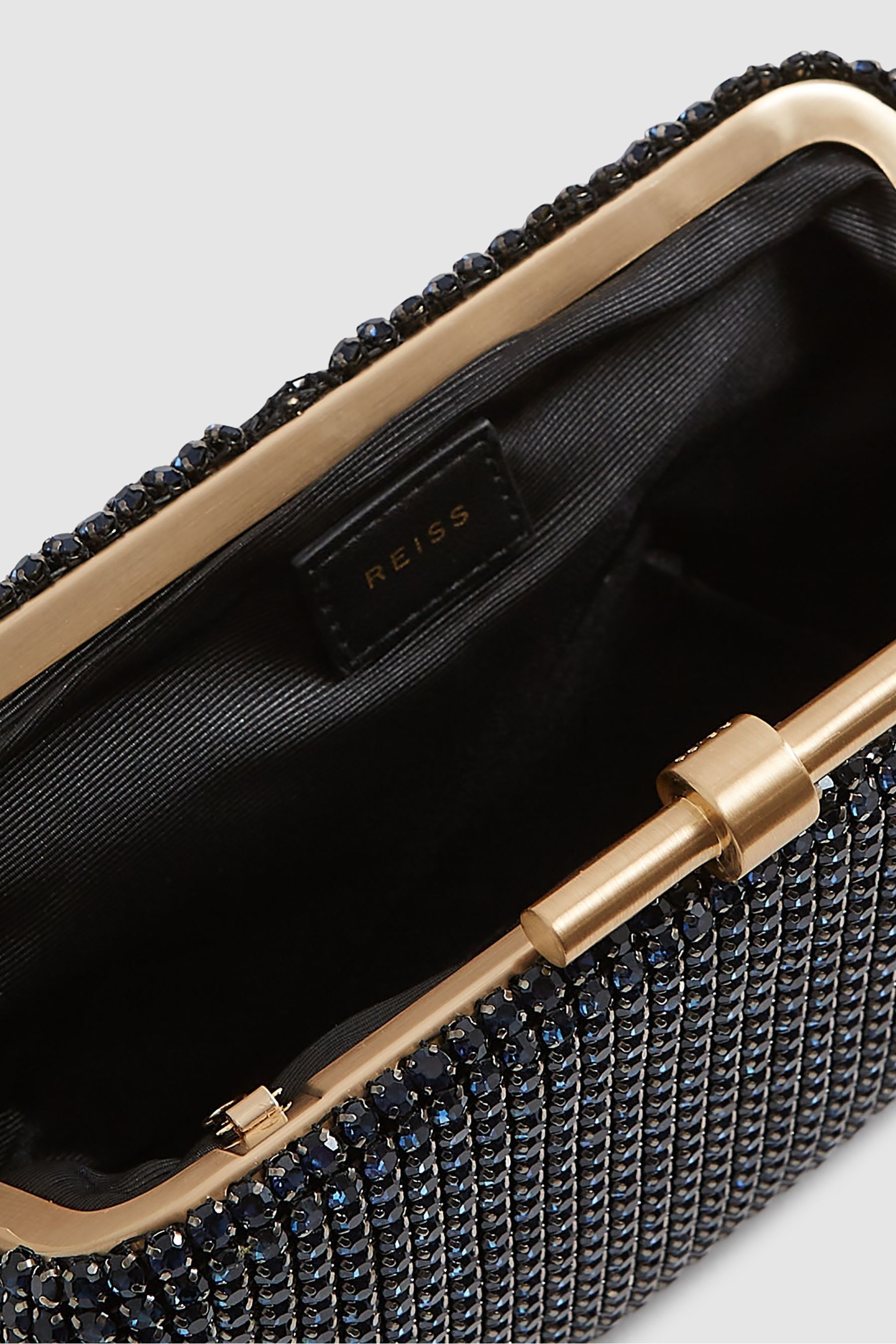 Navy embellished clutch bag shop