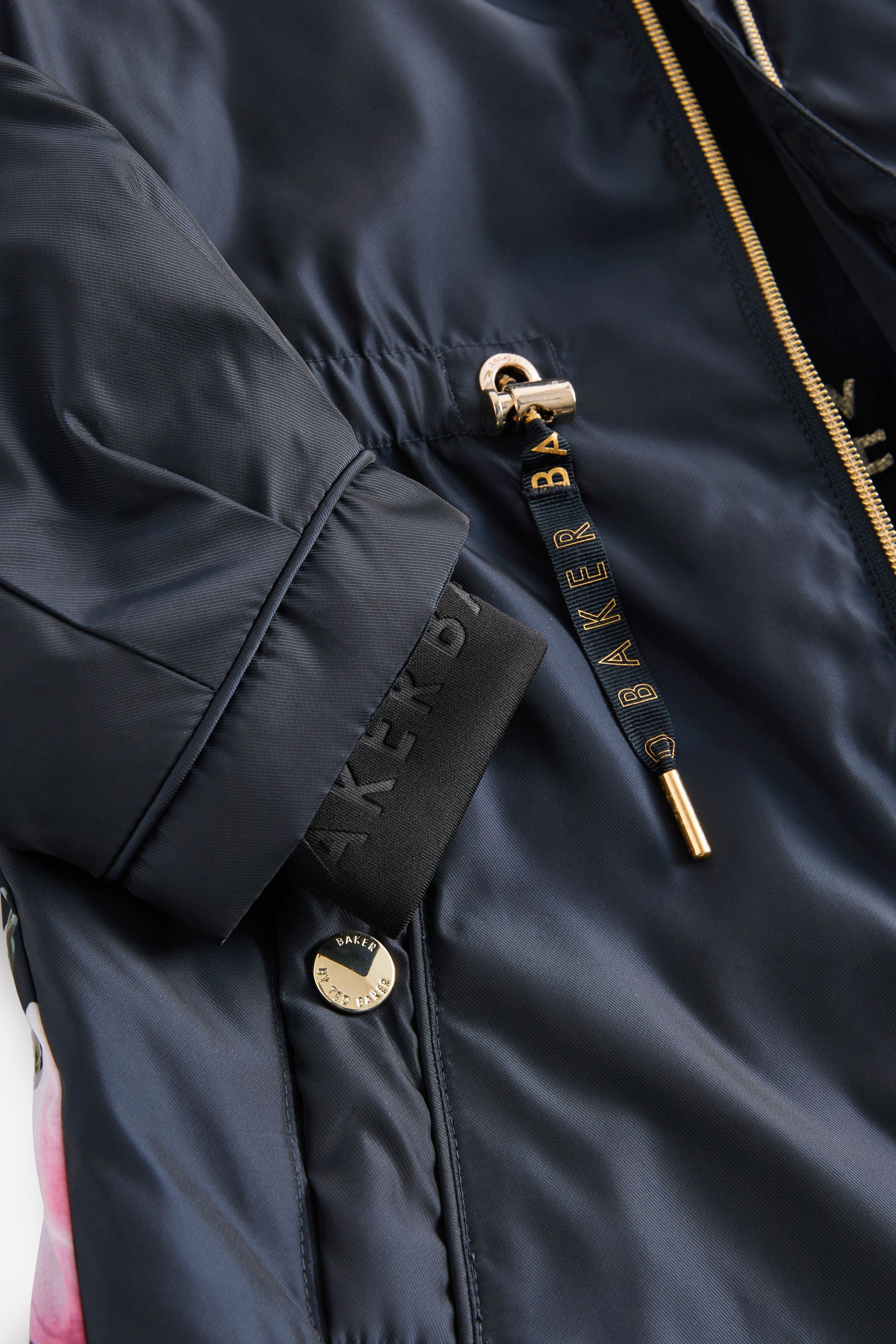 Buy Baker by Ted Baker Shower Resistant Navy Floral Rain Mac from Next Luxembourg