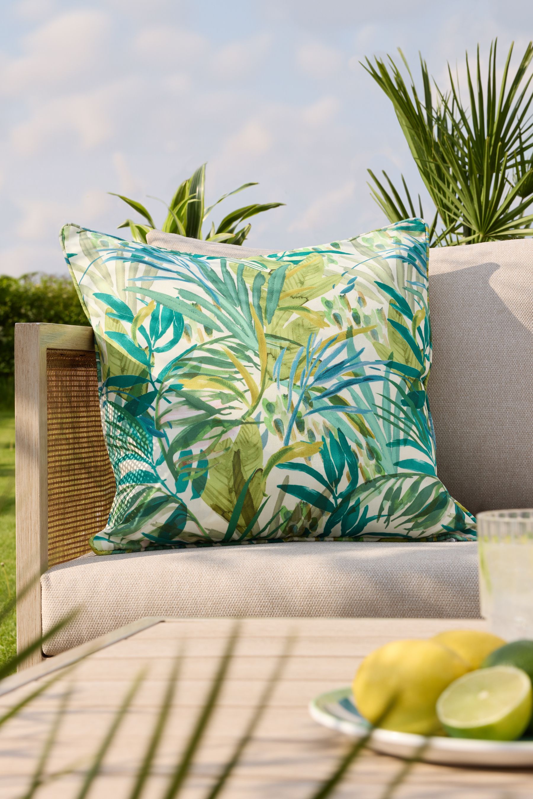 Buy Bright Green Tropical Leaf 50 x 50cm Outdoor Cushion from Next United Arab Emirates