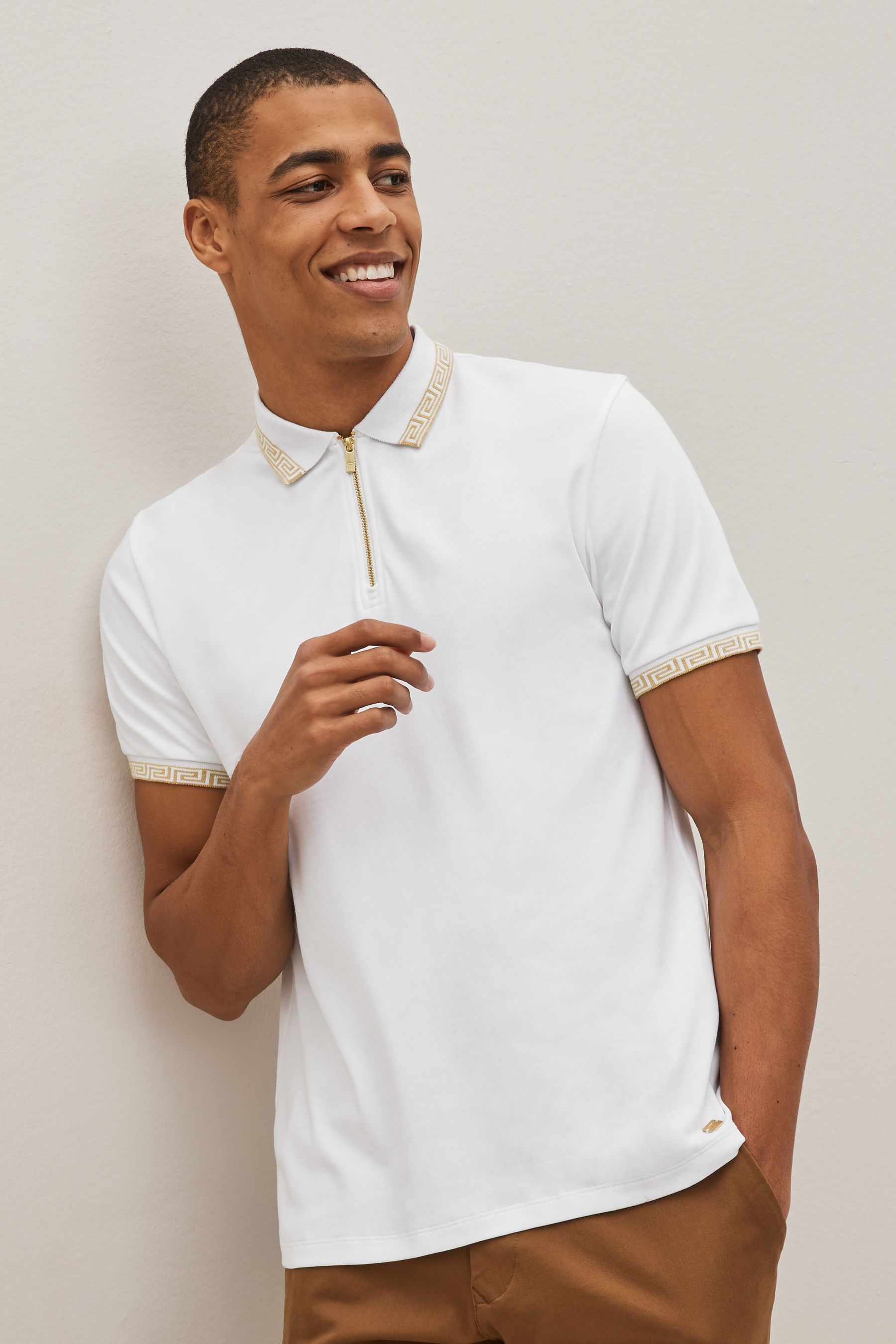 White and gold polo shirt discount
