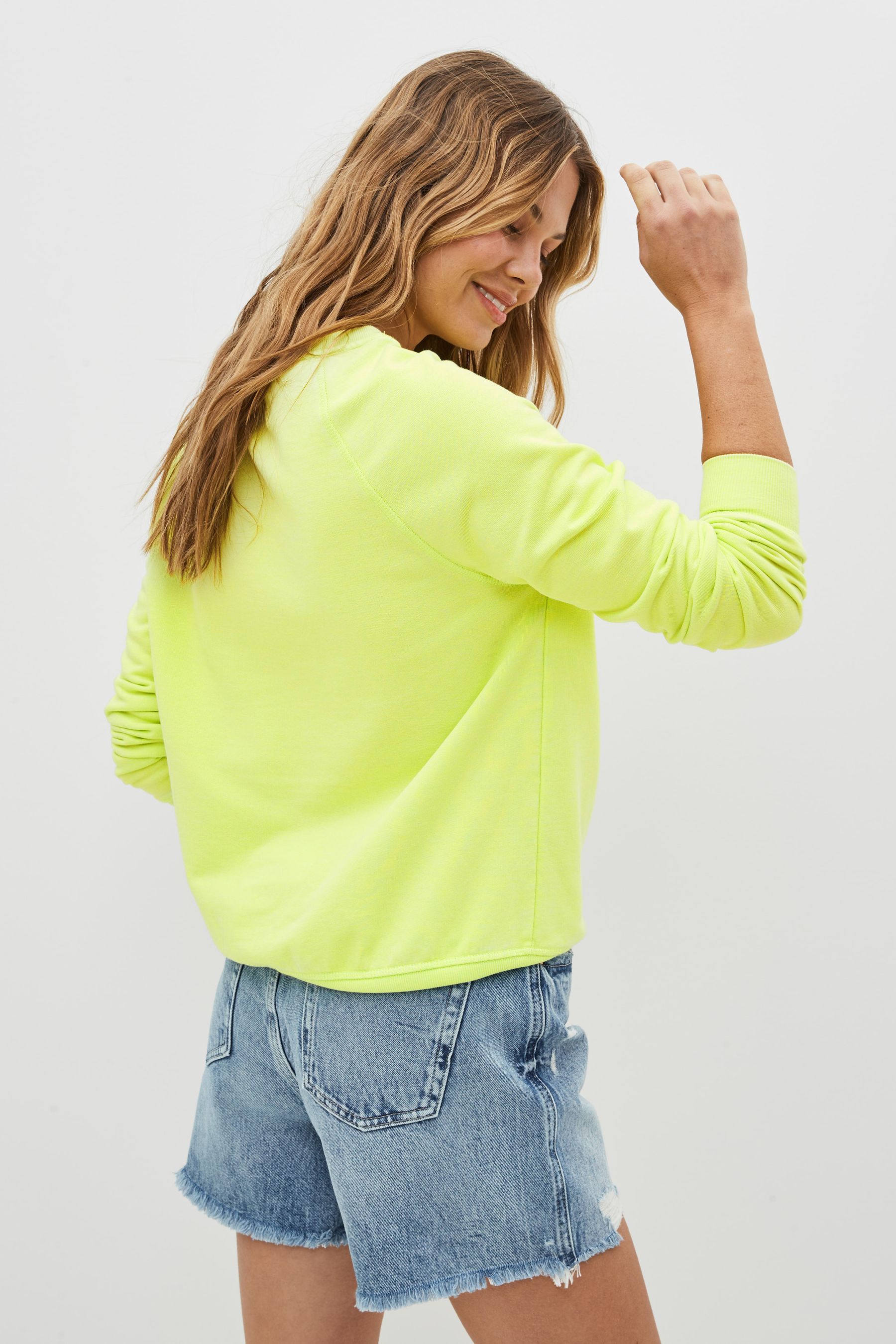 Buy Lime Green Coca Cola Graphic Sweatshirt from Next Luxembourg