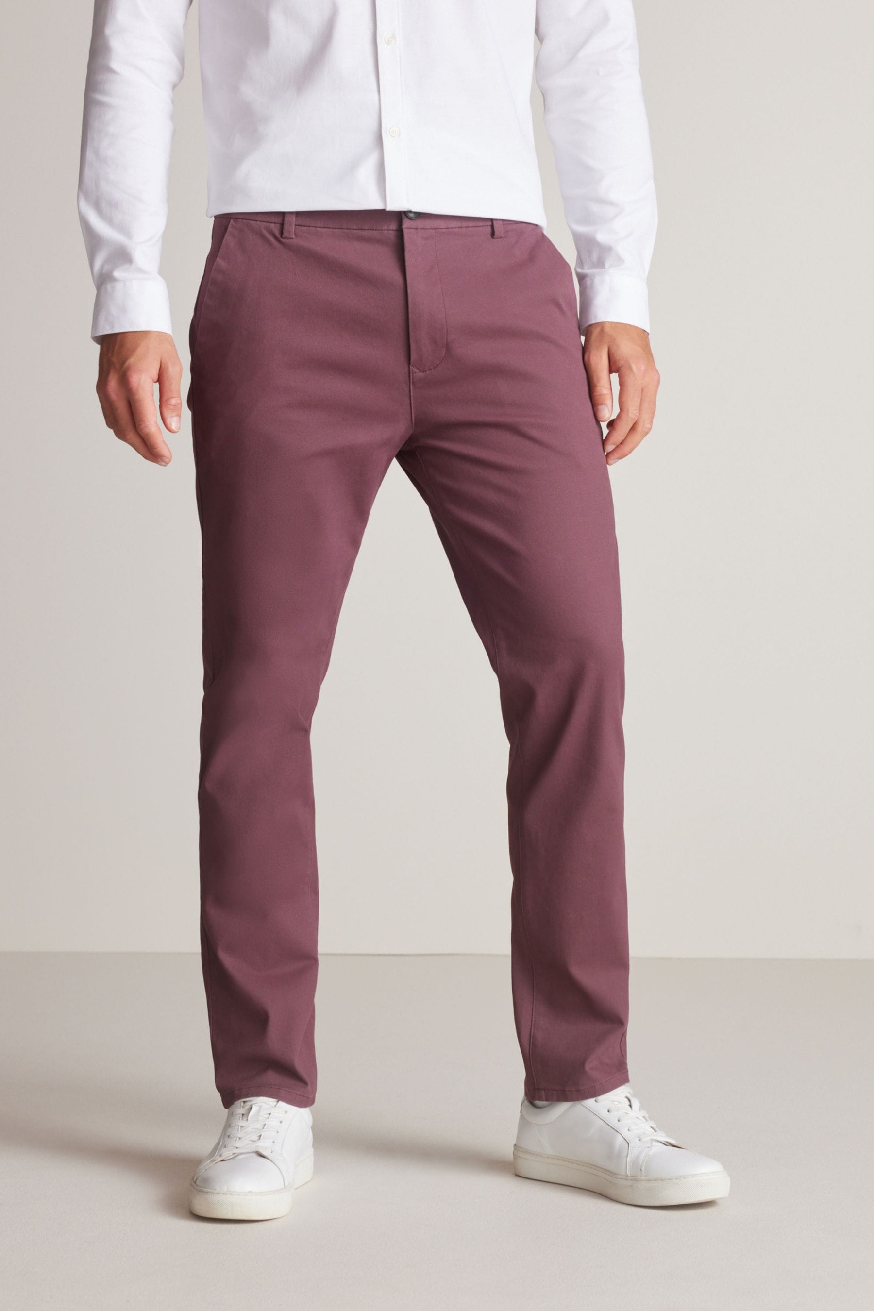 Buy Burgundy Red Stretch Chino Trousers from Next Qatar