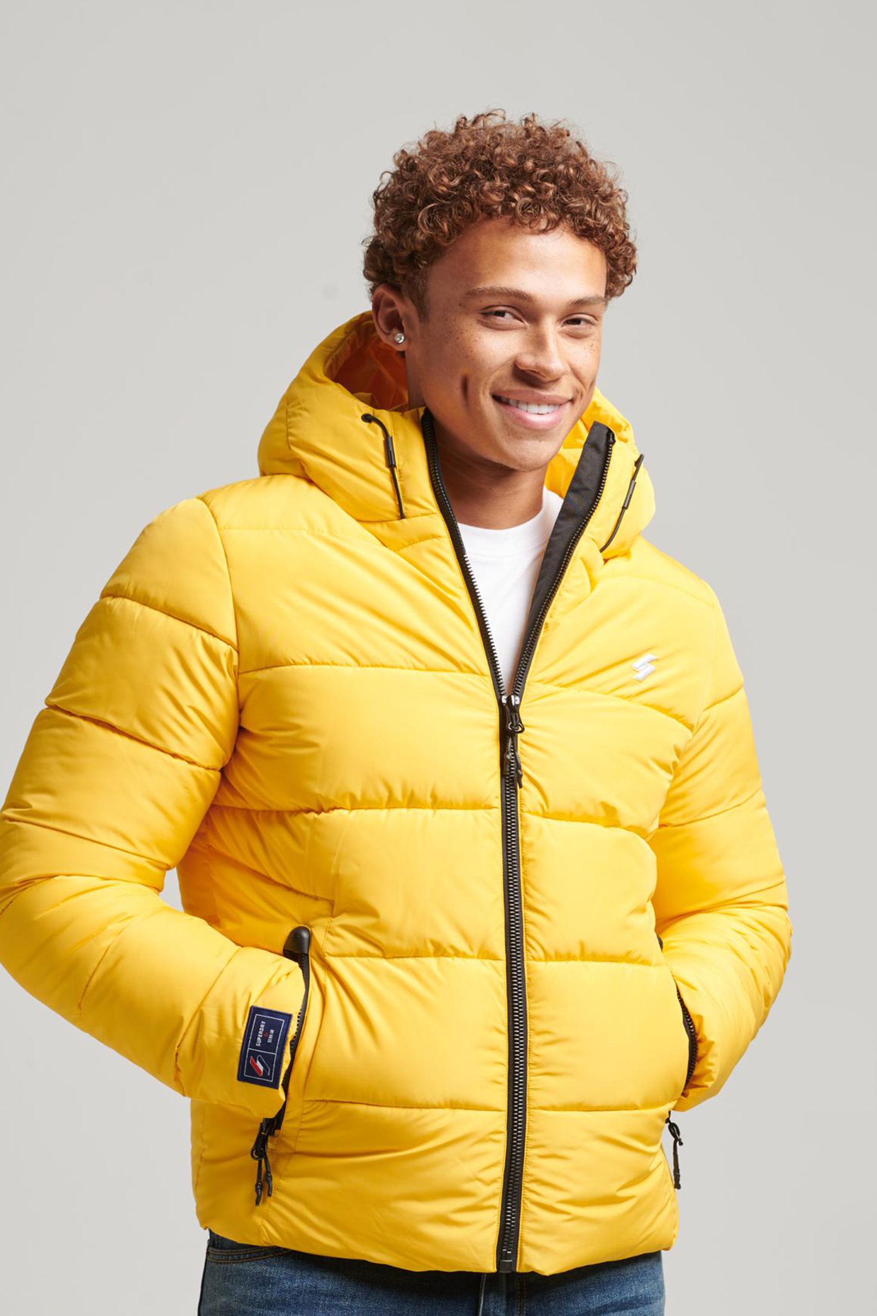 Buy Superdry Yellow Sports Puffer Hooded Jacket from Next Ireland