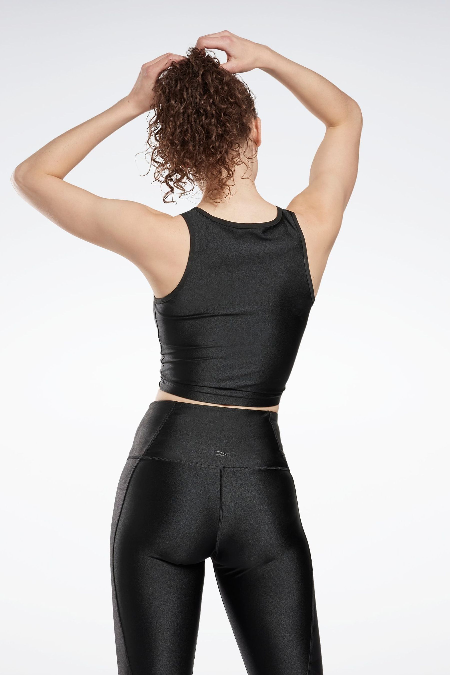 Buy Reebok Black Shiny Yoga Scribble Crop Tank Top from Next Luxembourg