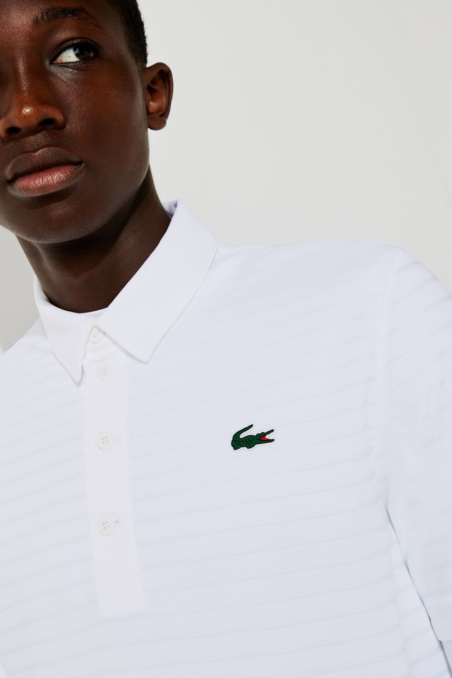 Buy Lacoste Mens White Golf Essentials Polo Shirt from Next Luxembourg
