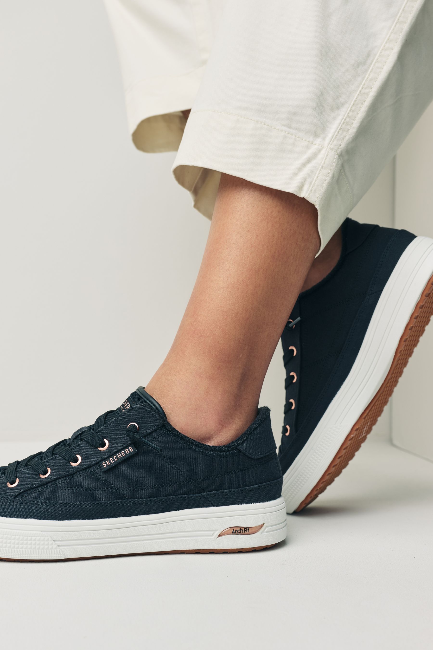 Black skechers next shop