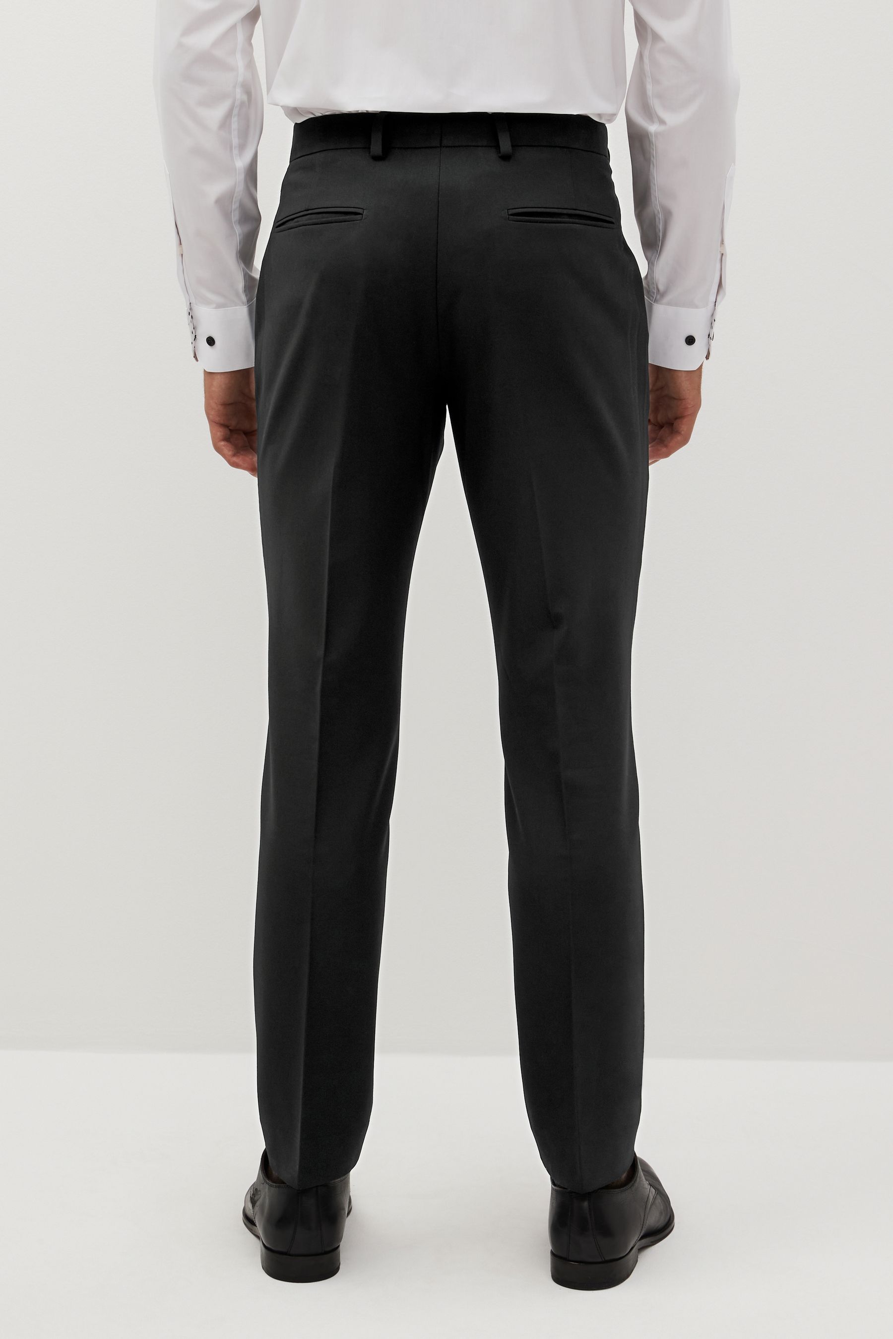 Tight fit black sales trousers