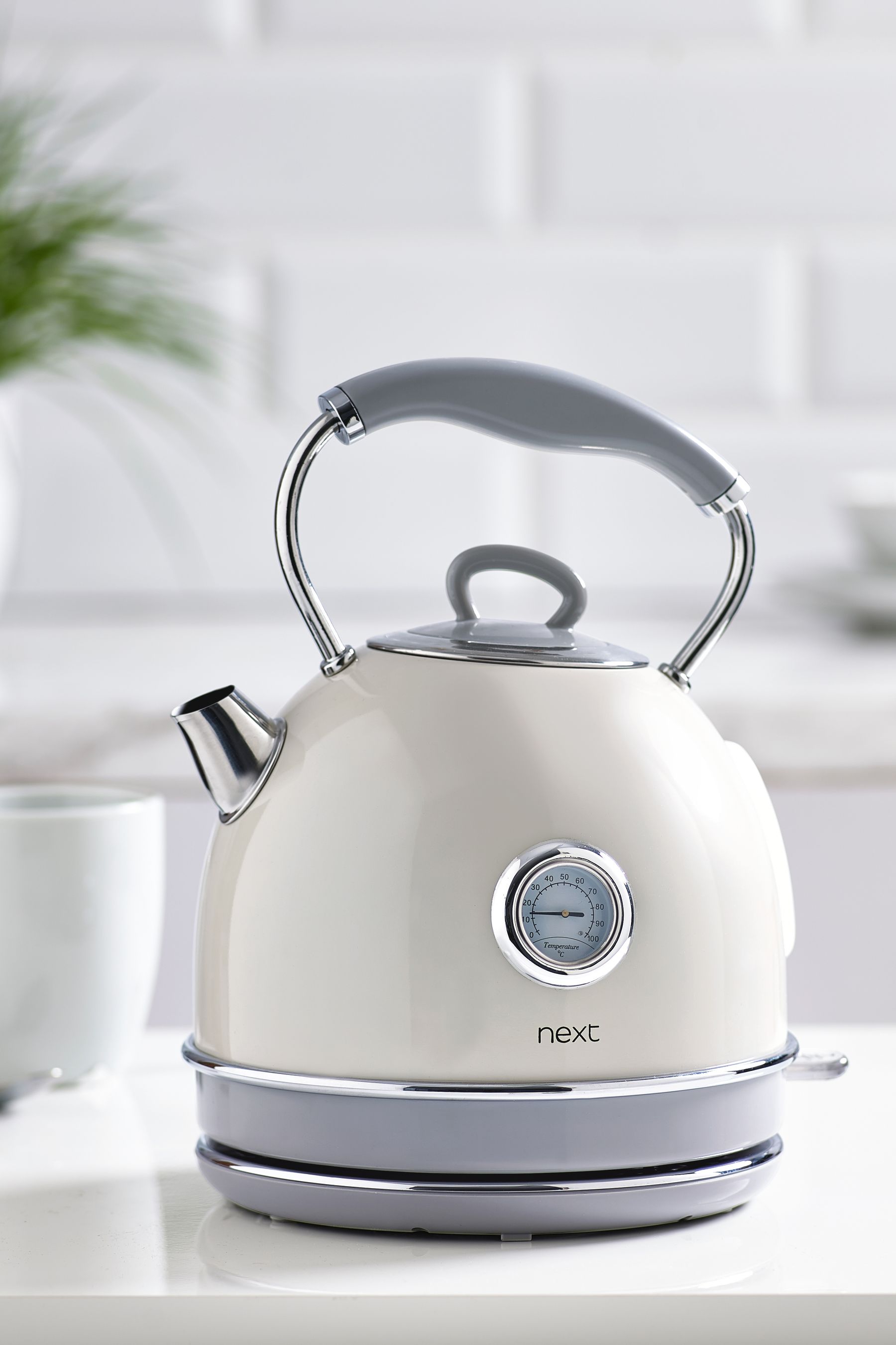 Cream and silver sales kettle