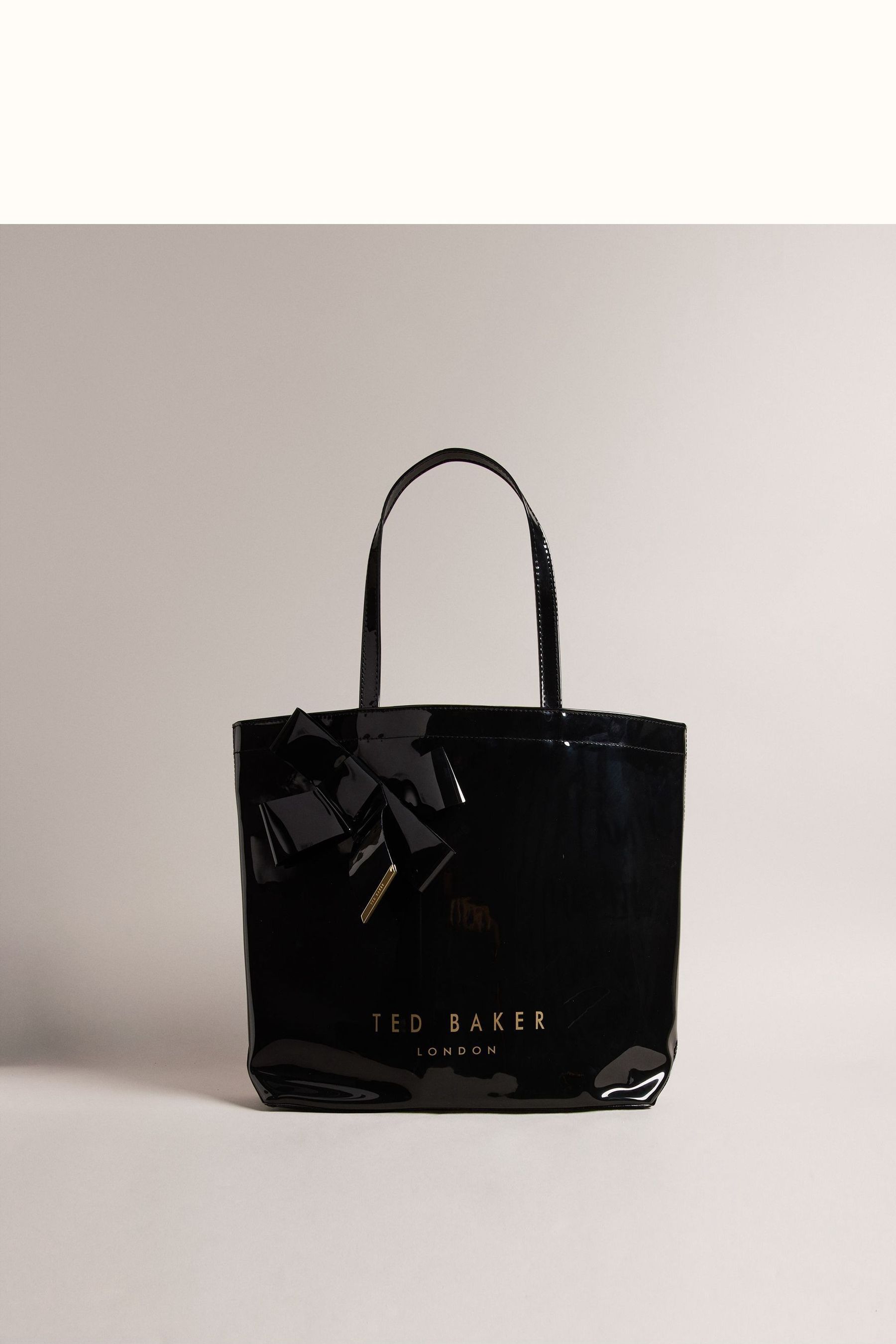 Ted baker bow online suitcase