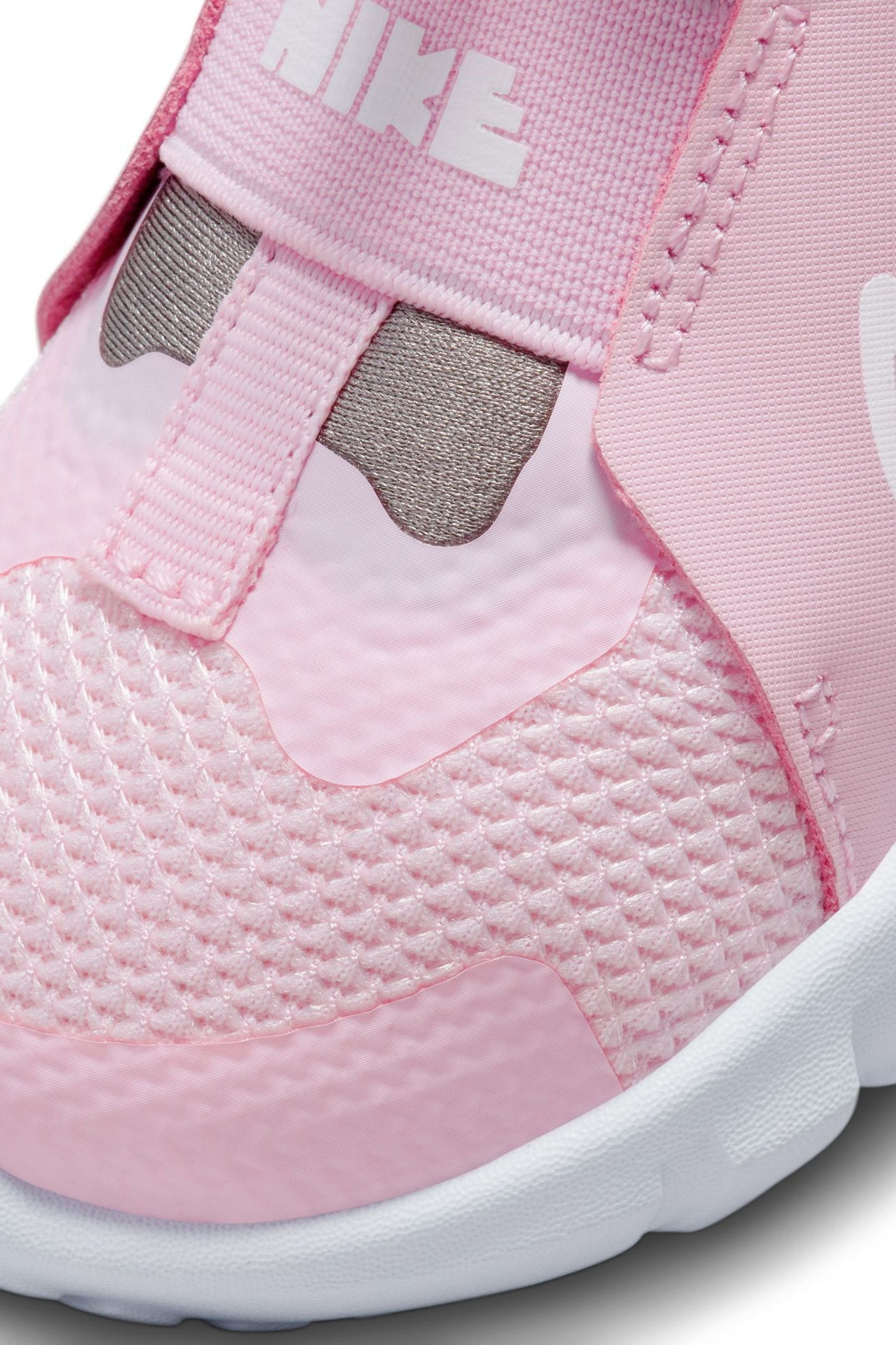 Kids pink top nike trainers