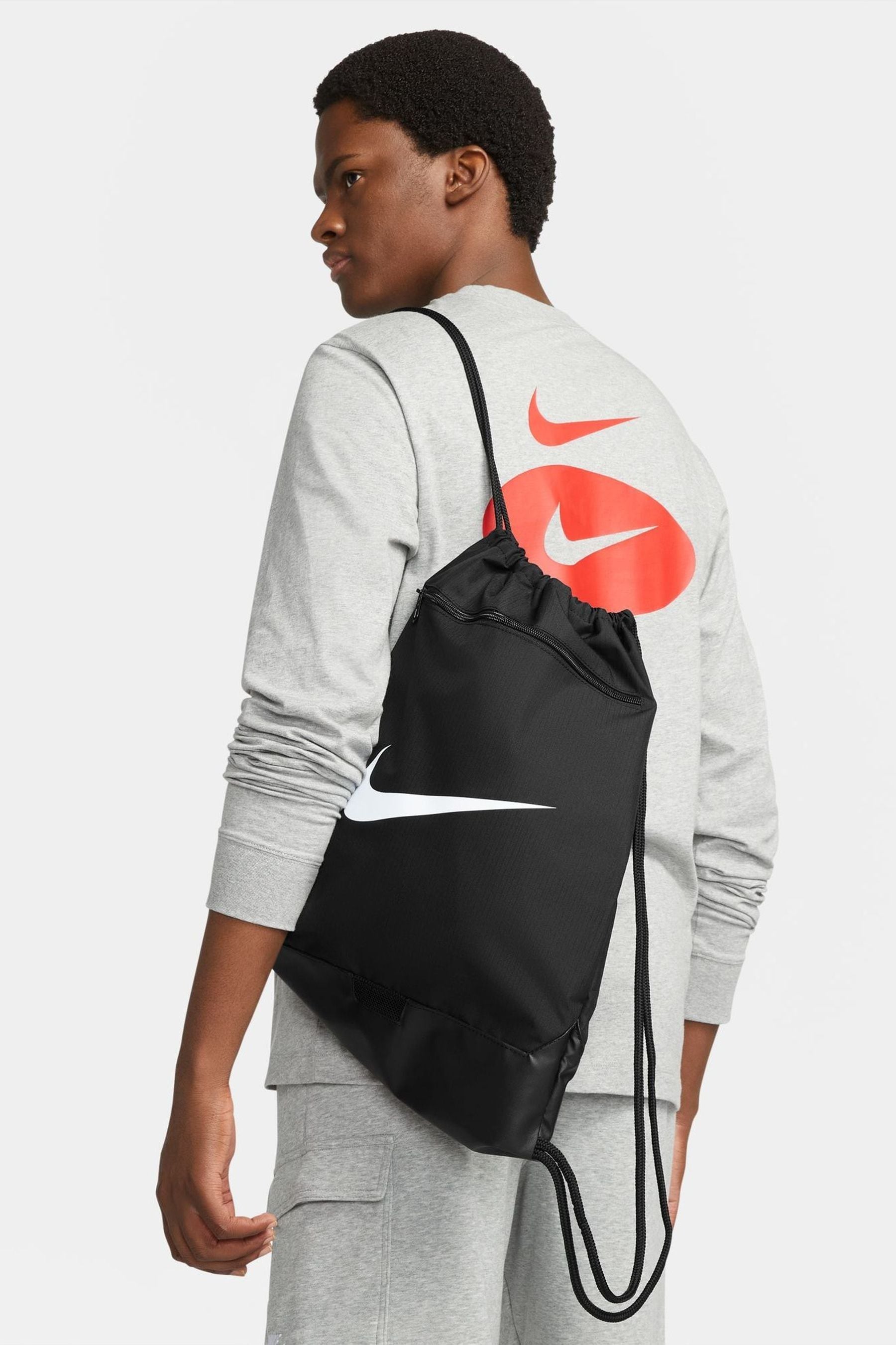 Buy Nike Black White Brasilia Drawstring Bag from the Next UK
