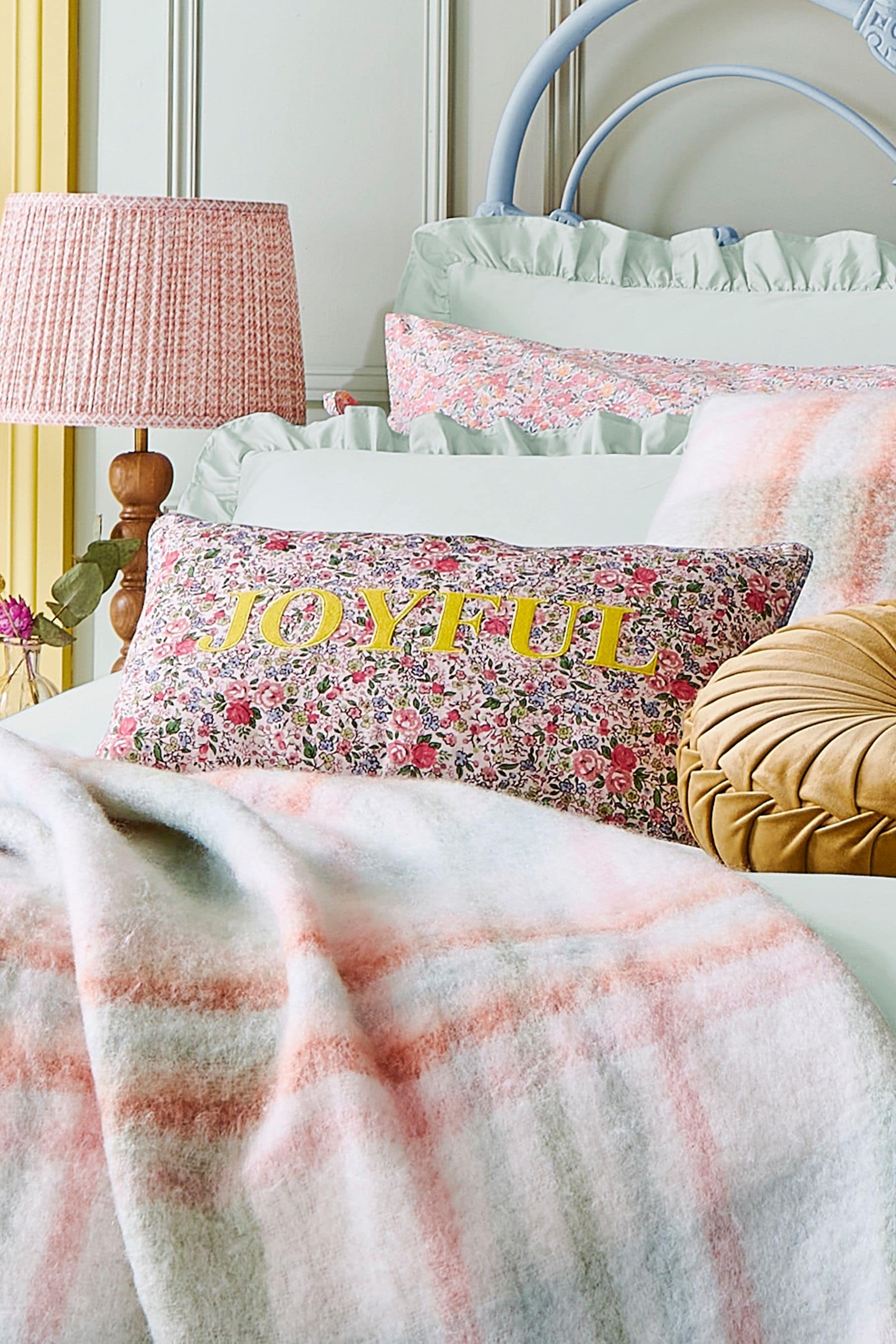 Pink feather cushion store