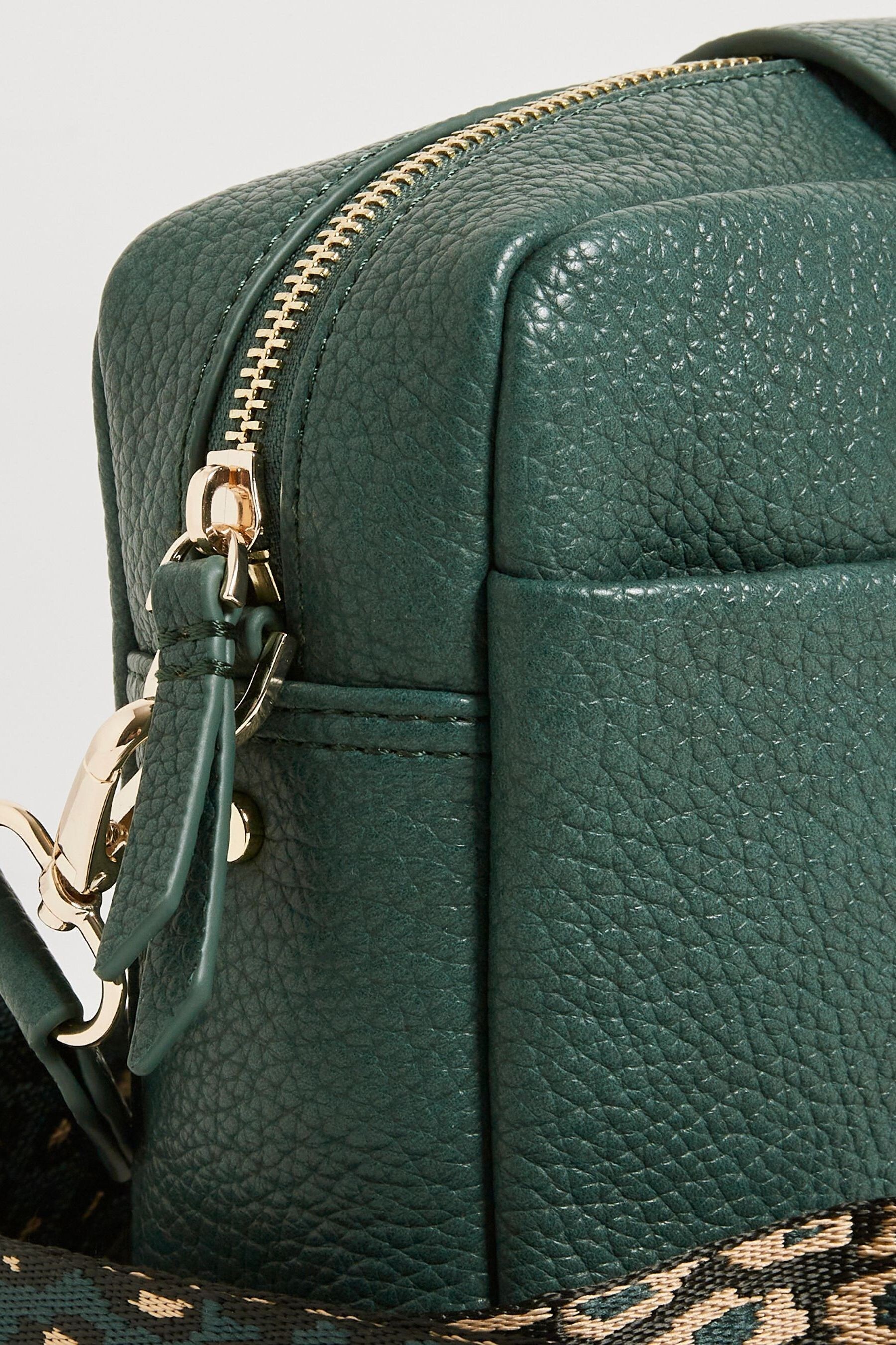 Oliver bonas best sale camera bag
