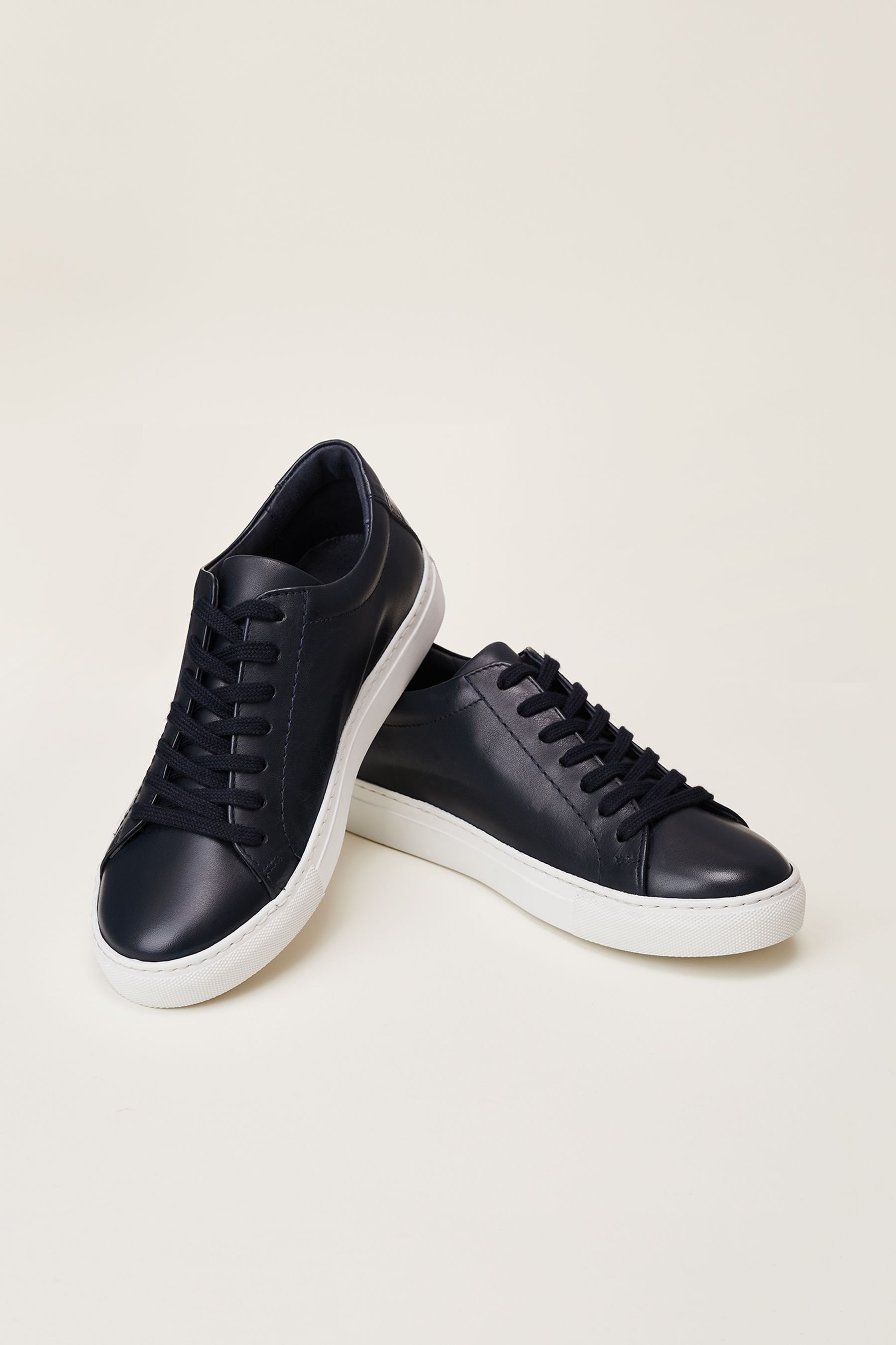 Navy trainers clearance white sole