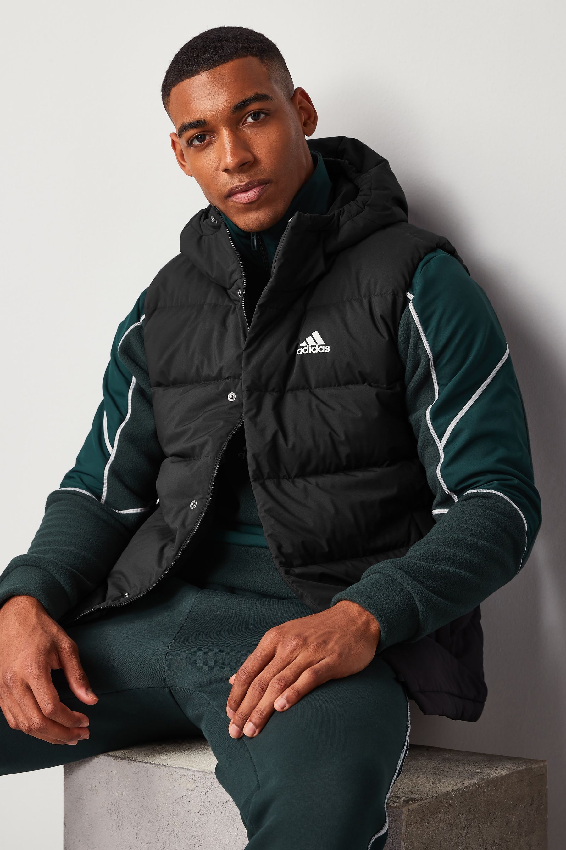 Buy adidas Black Sportswear Helionic Hooded Down Vest from the