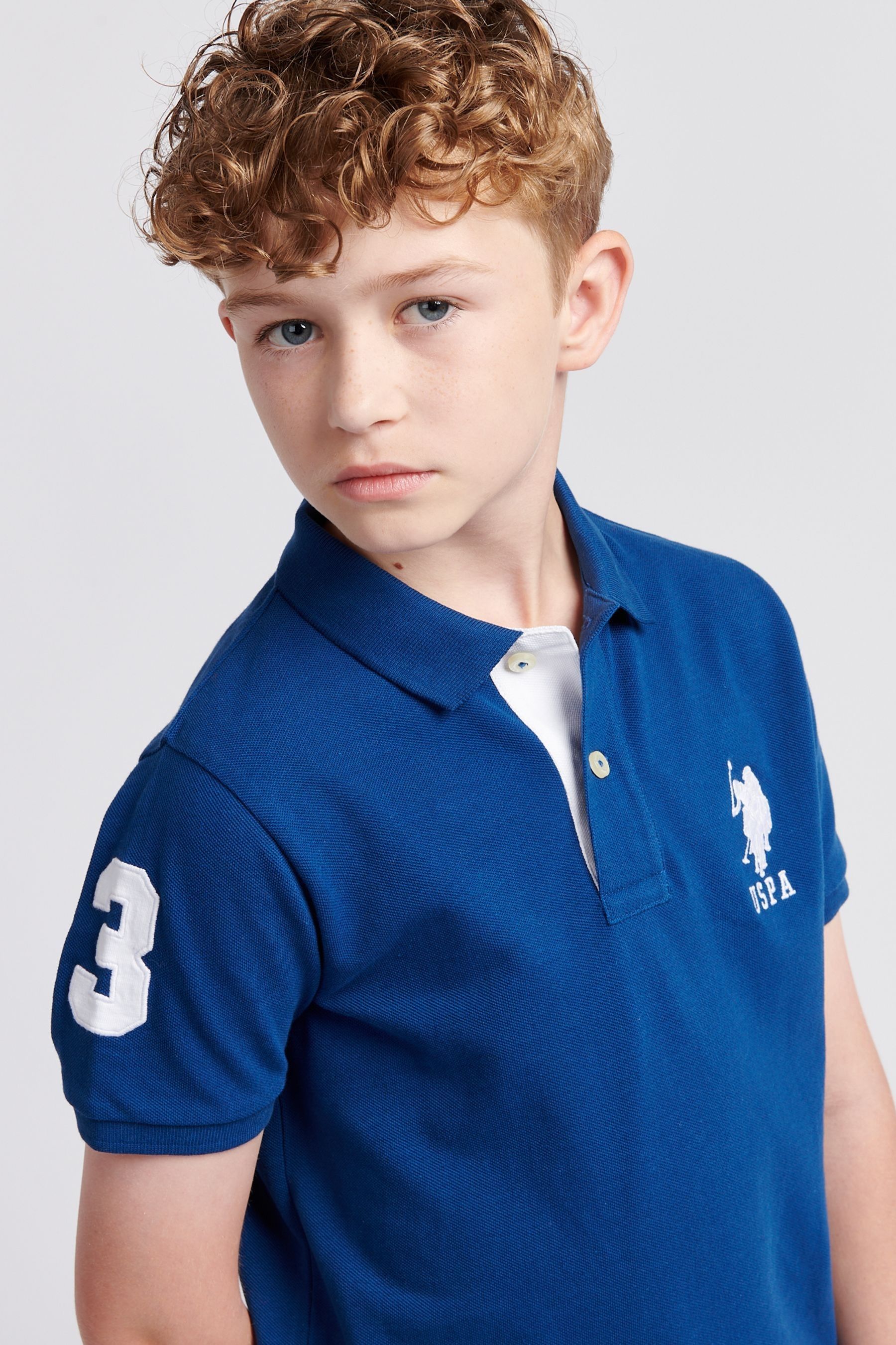 Boys navy blue polo clearance