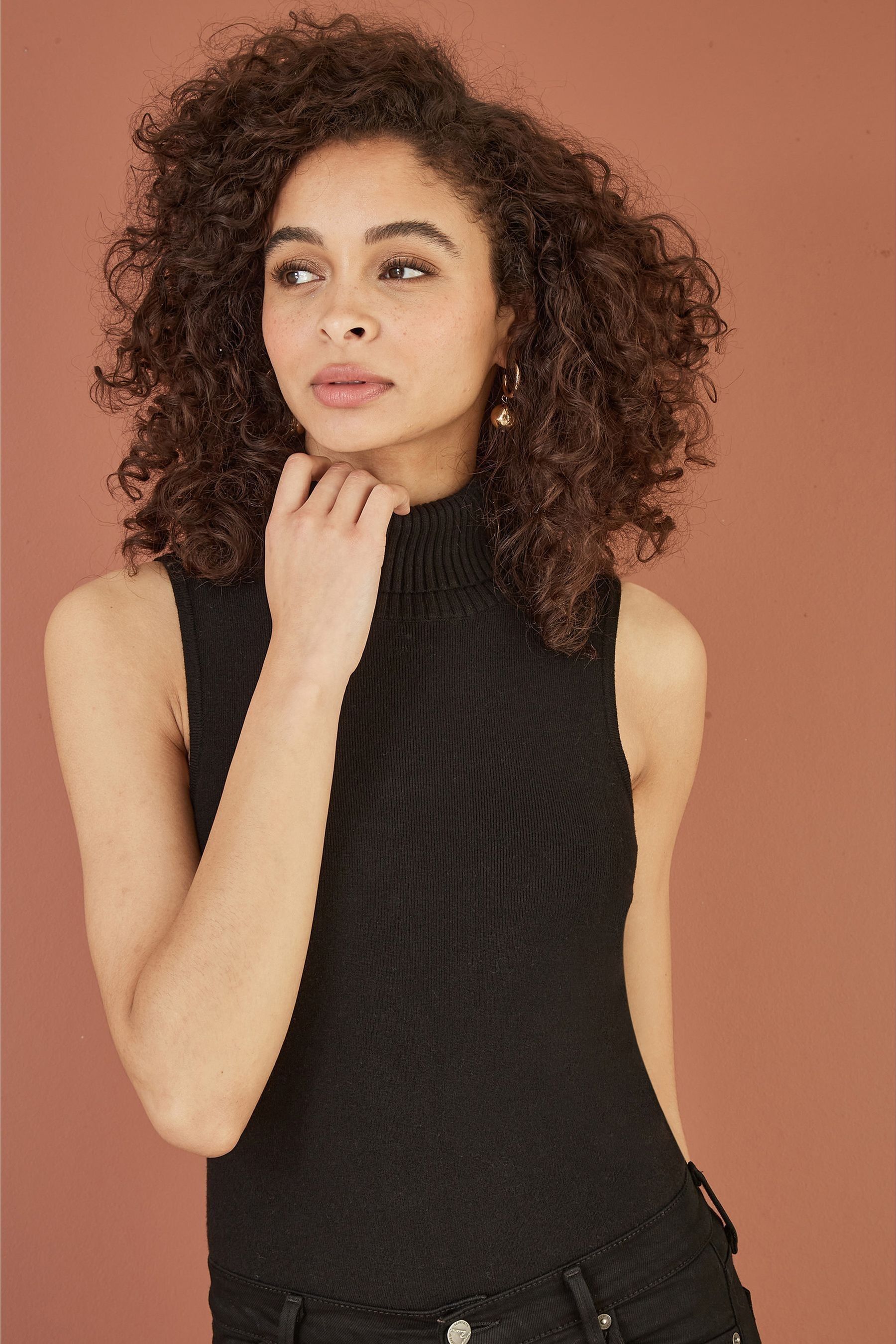 Buy Yumi Black Knitted Roll Neck Sleeveless Jumper from the Next UK online shop