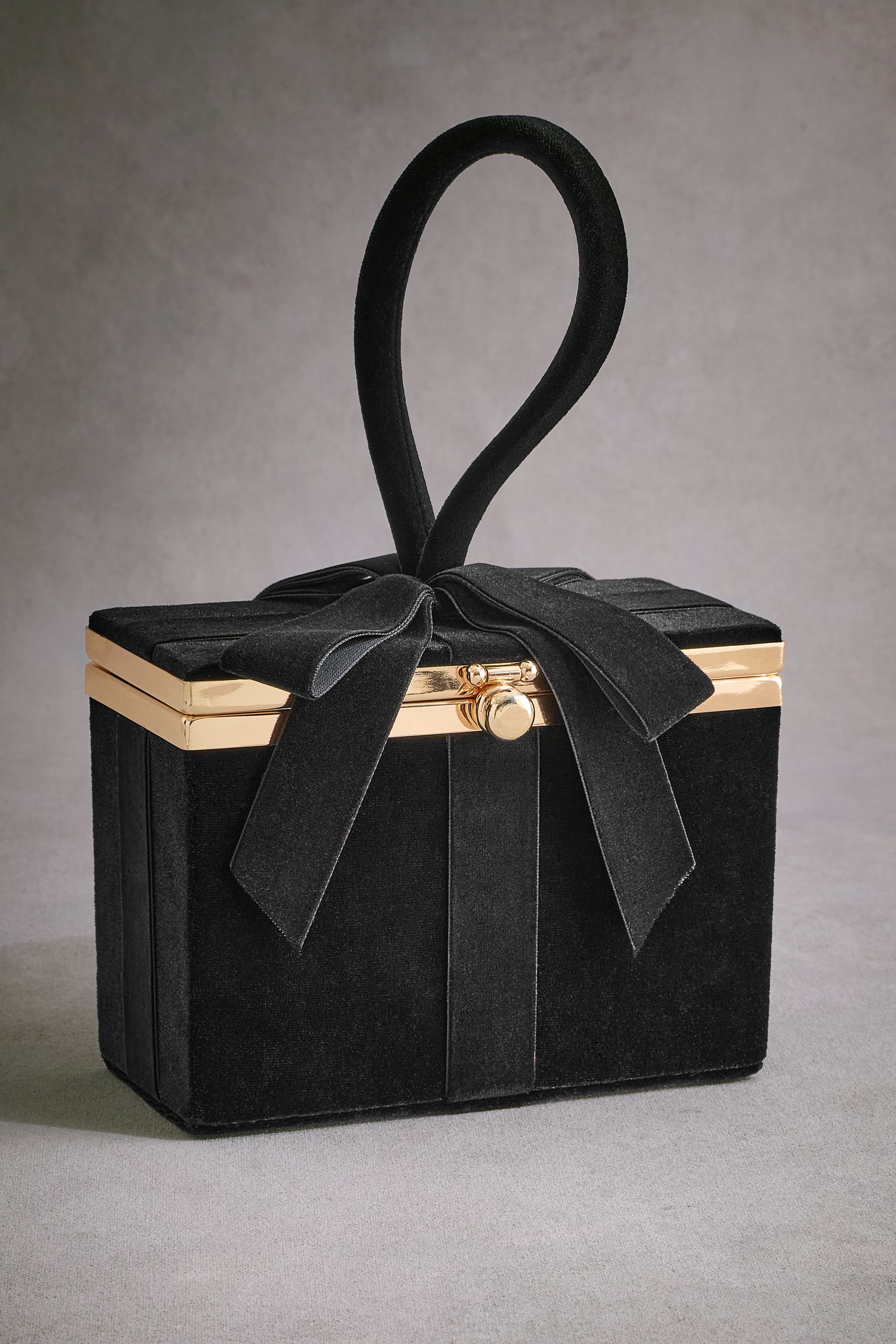 Buy Black Tabitha Simmons Present Bow Box Clutch Bag from the Next UK online shop