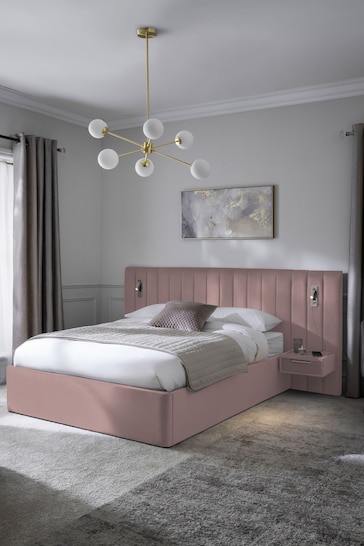Soft Velvet Blush Pink Mayfair Upholstered Hotel Bed Frame with Ottoman Storage Bedside Tables and Lights
