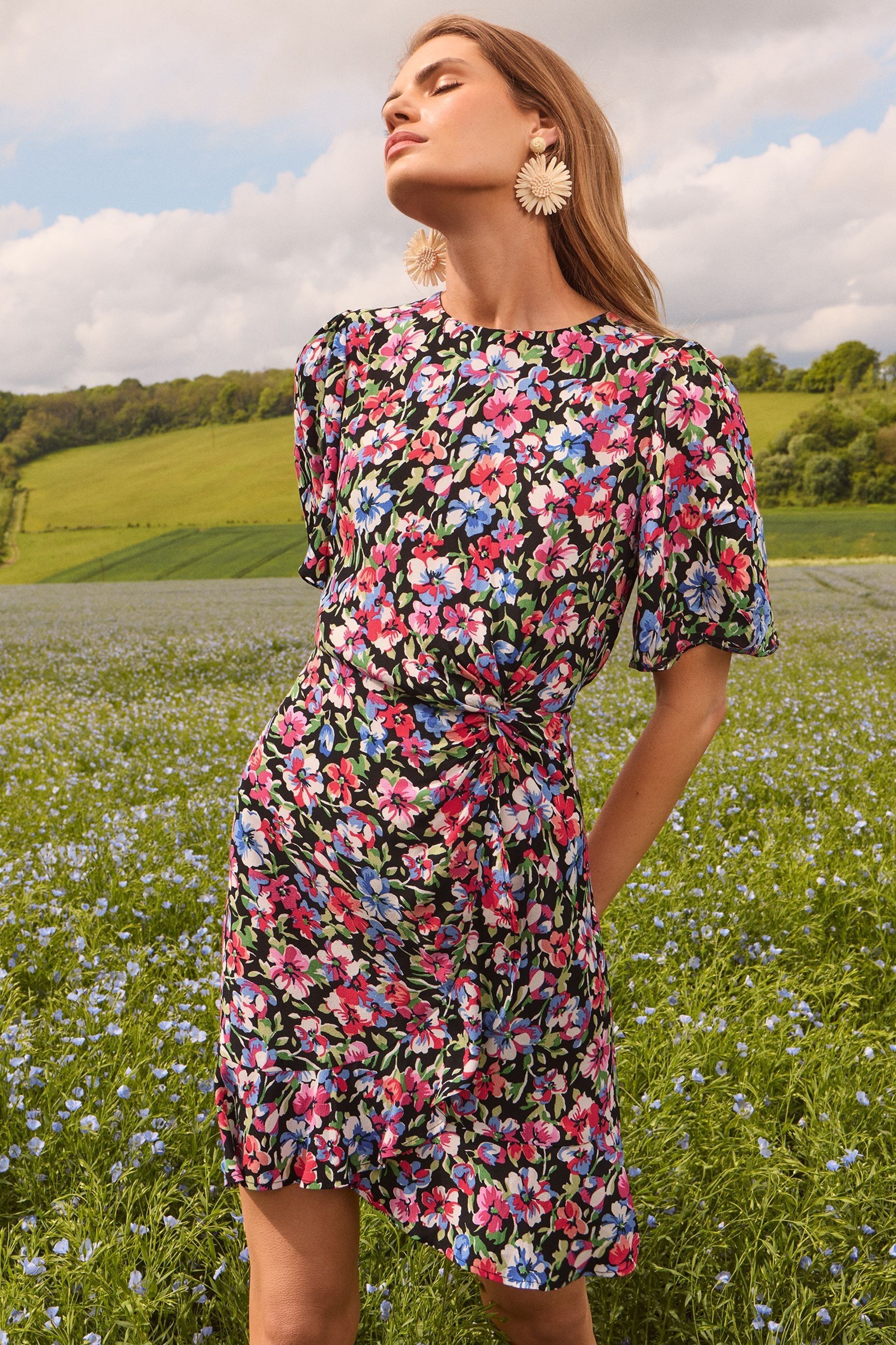 Floral flutter sleeve dress top