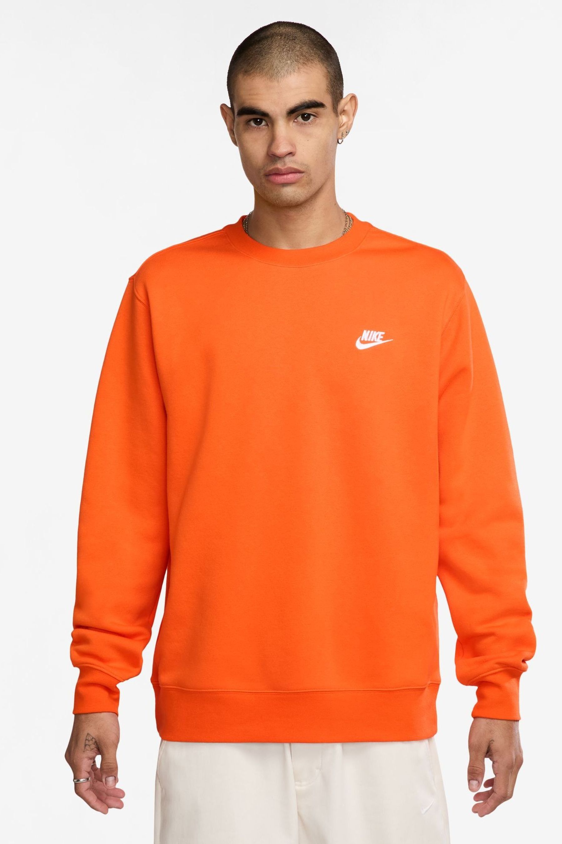 Nike retailers run club coach bennett