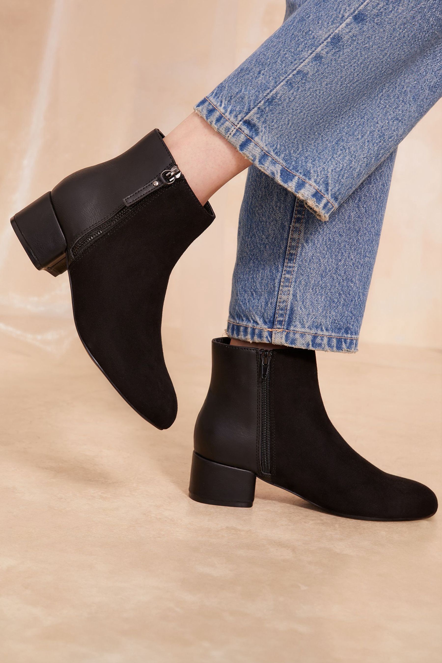 Black leatherette low ankle boot on sale