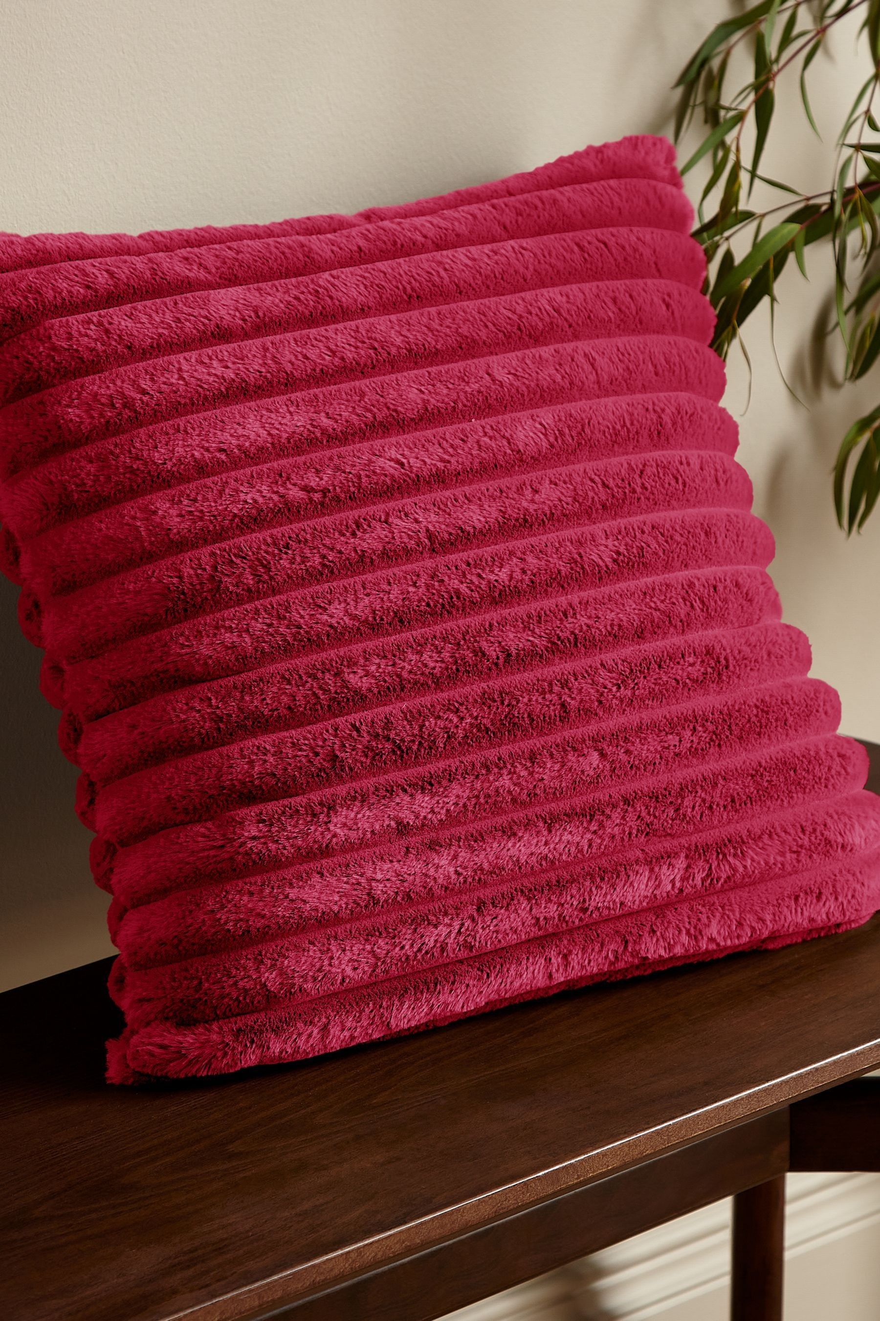 Buy Catherine Lansfield Hot Pink Soft and Cosy Ribbed Faux Fur Cushion from the Next UK online shop