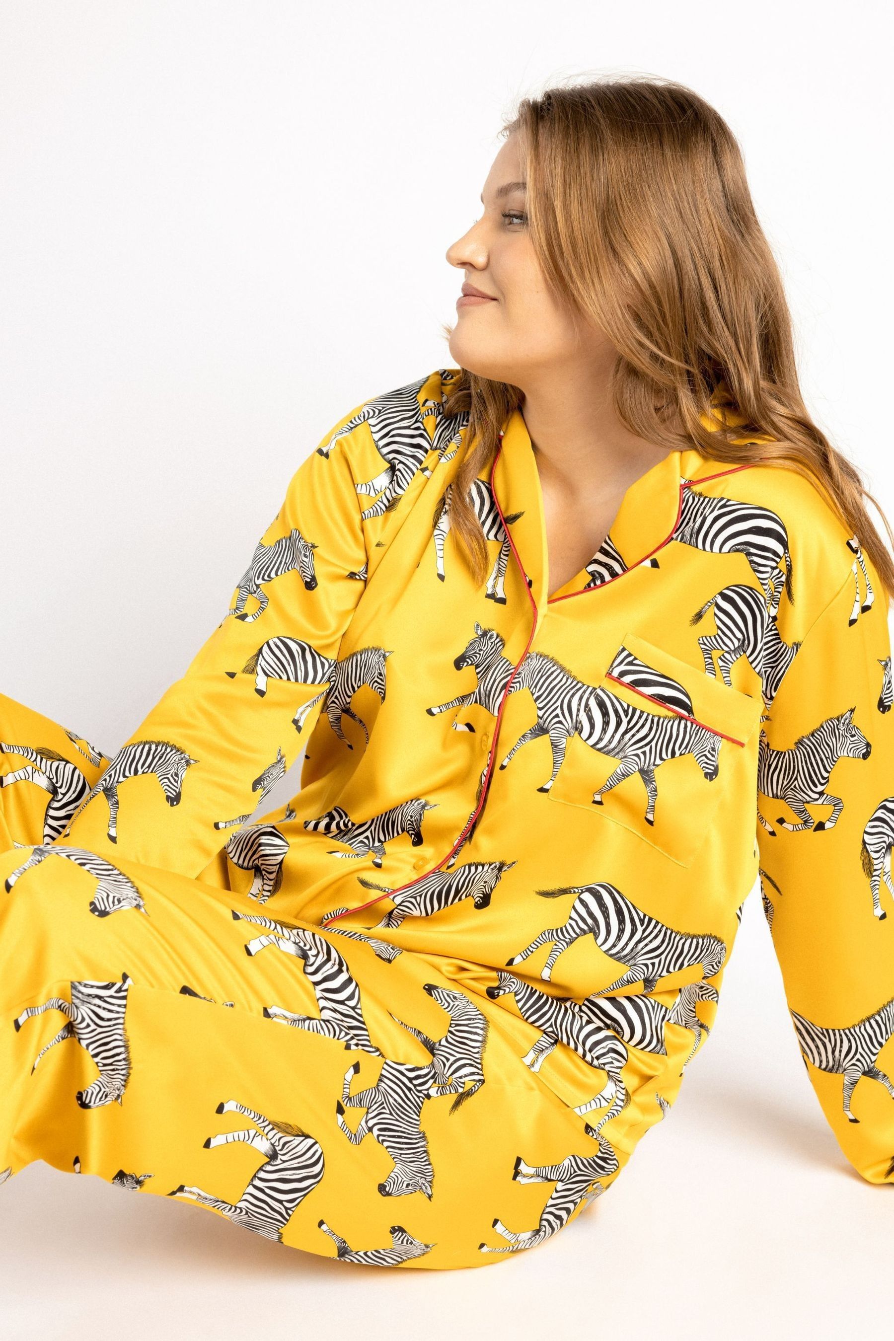 Buy Chelsea Peers Yellow Curve Satin Mustard Zebra Print Long Pyjama Set from the Next UK online shop