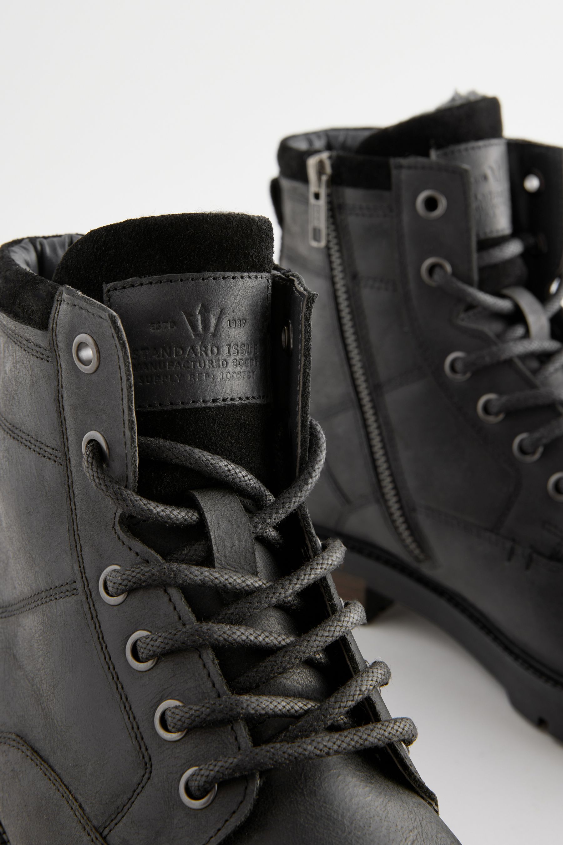 Black leather zip boots top