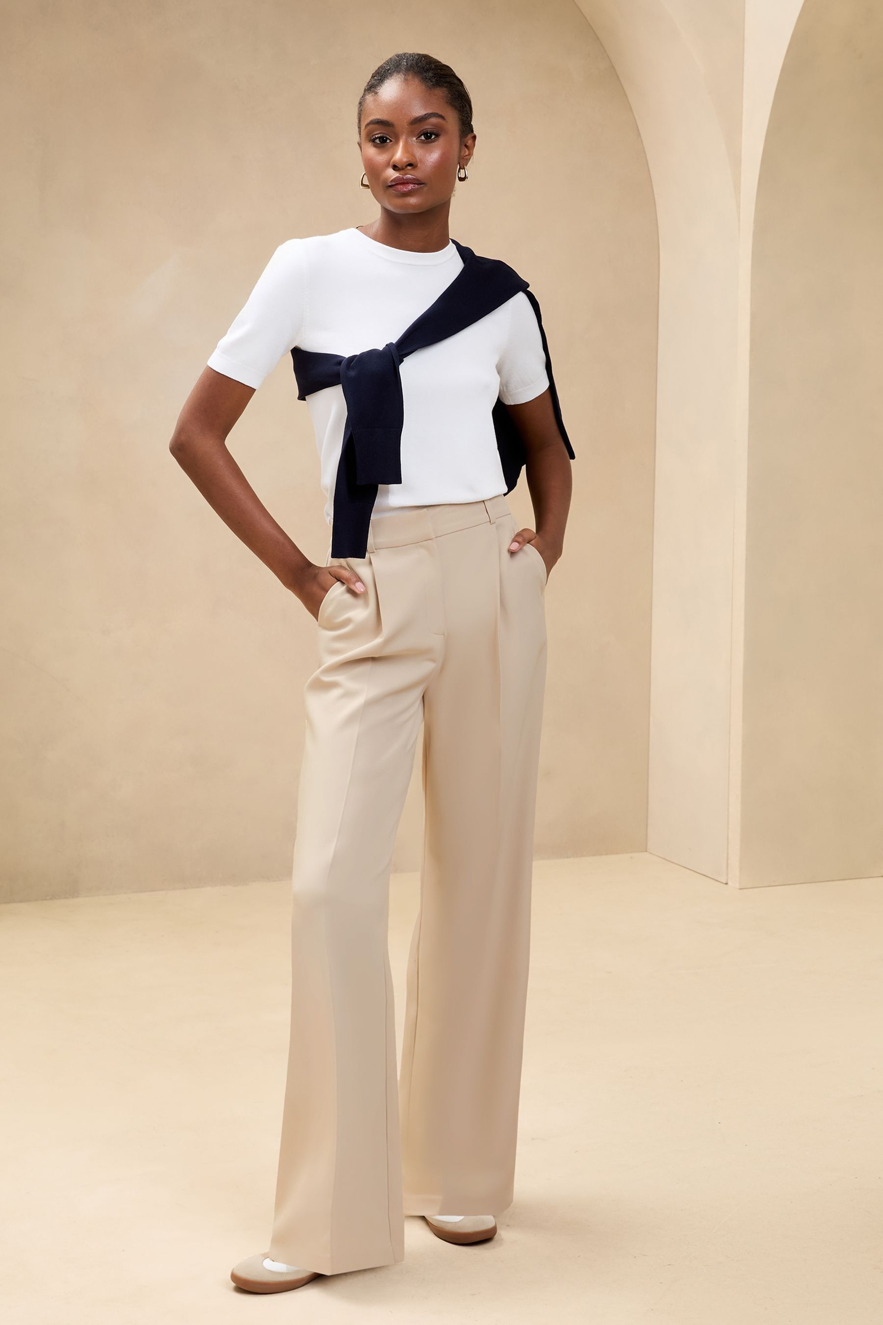 Buy Lipsy Cream Wide Leg Popper Detail Trousers from the Next UK online shop