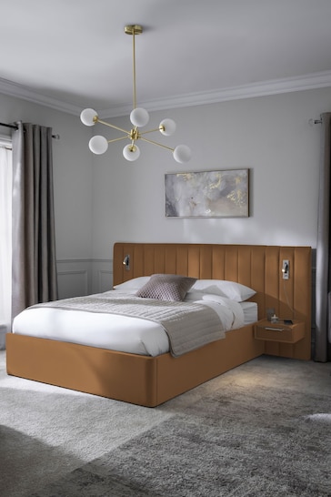 Soft Velvet Caramel Brown Mayfair Upholstered Hotel Bed Frame with Ottoman Storage Bedside Tables and Lights