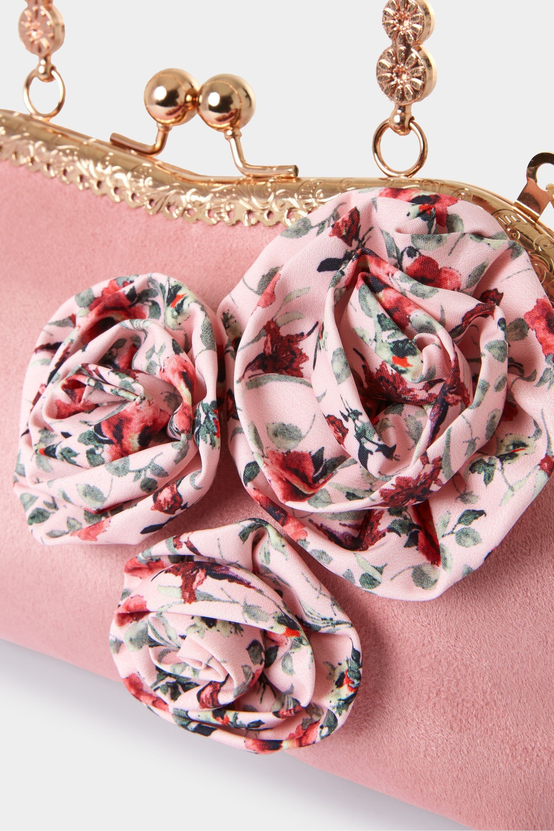 Pink floral clutch bag store