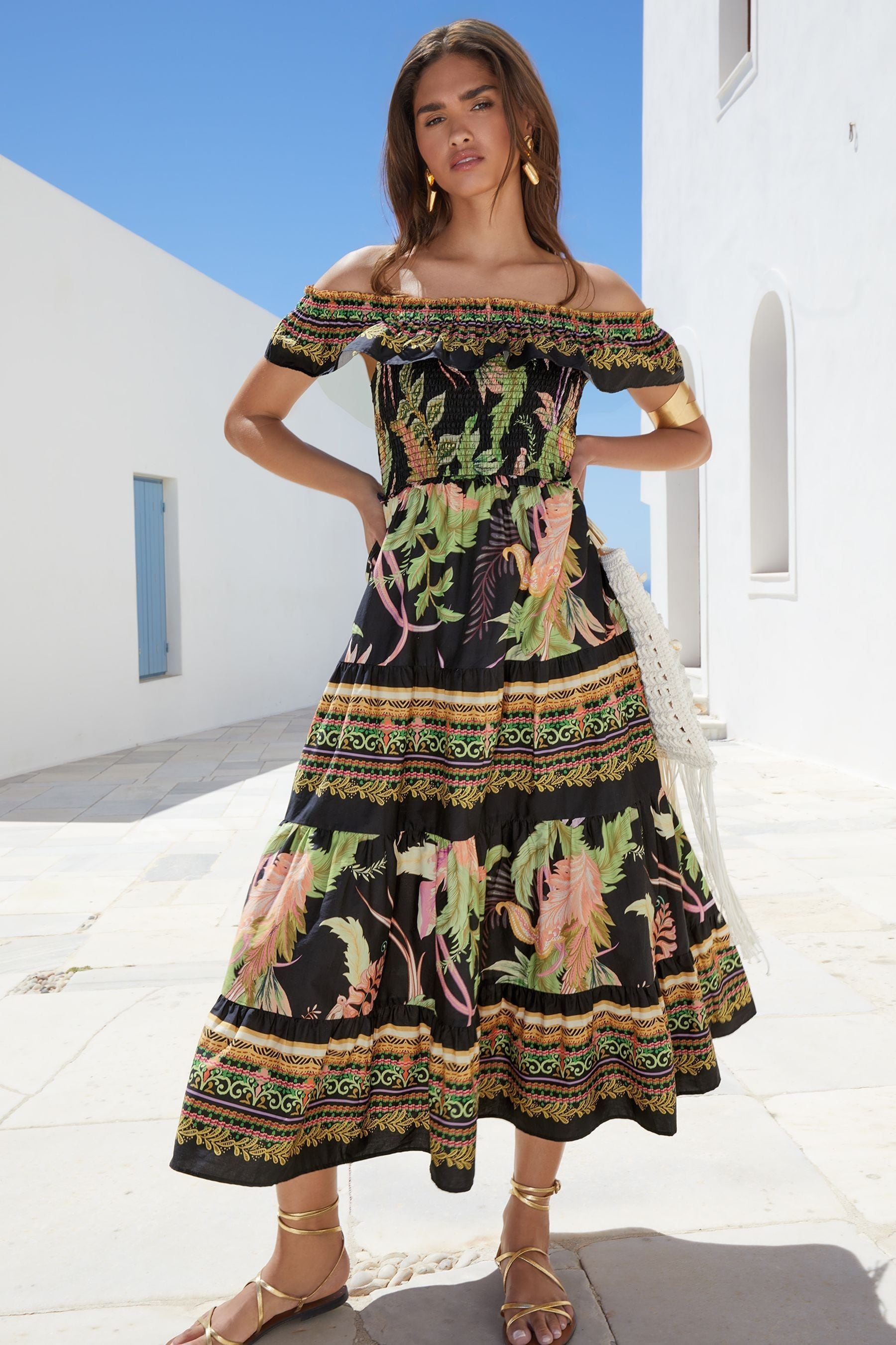 Buy Lipsy Black Shirred Bardot Tiered Maxi Holiday Printed Dress from the Next UK online shop