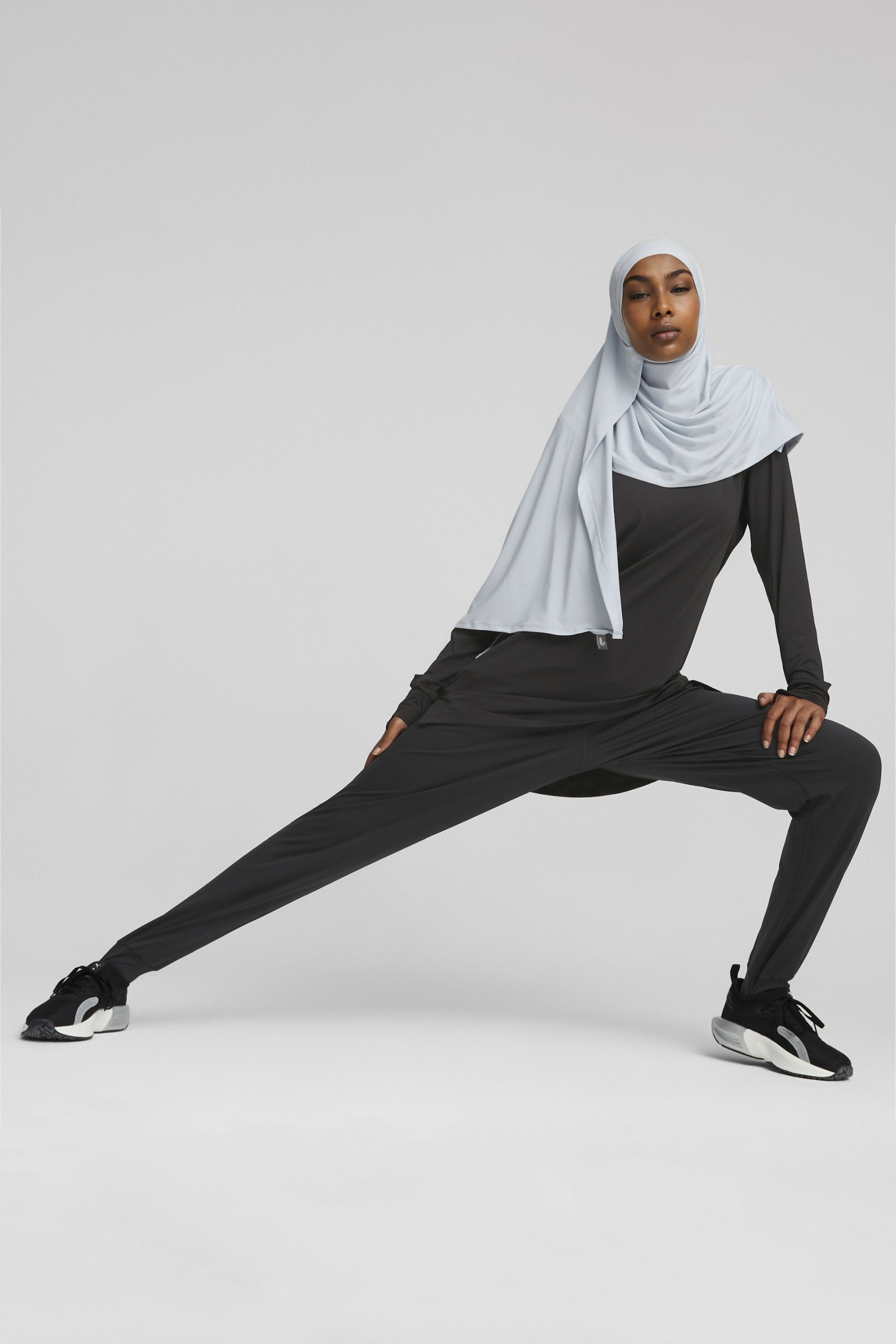 Buy Puma Black Womens Modest Activewear Long Sleeve Training T Shirt from the Next UK online shop