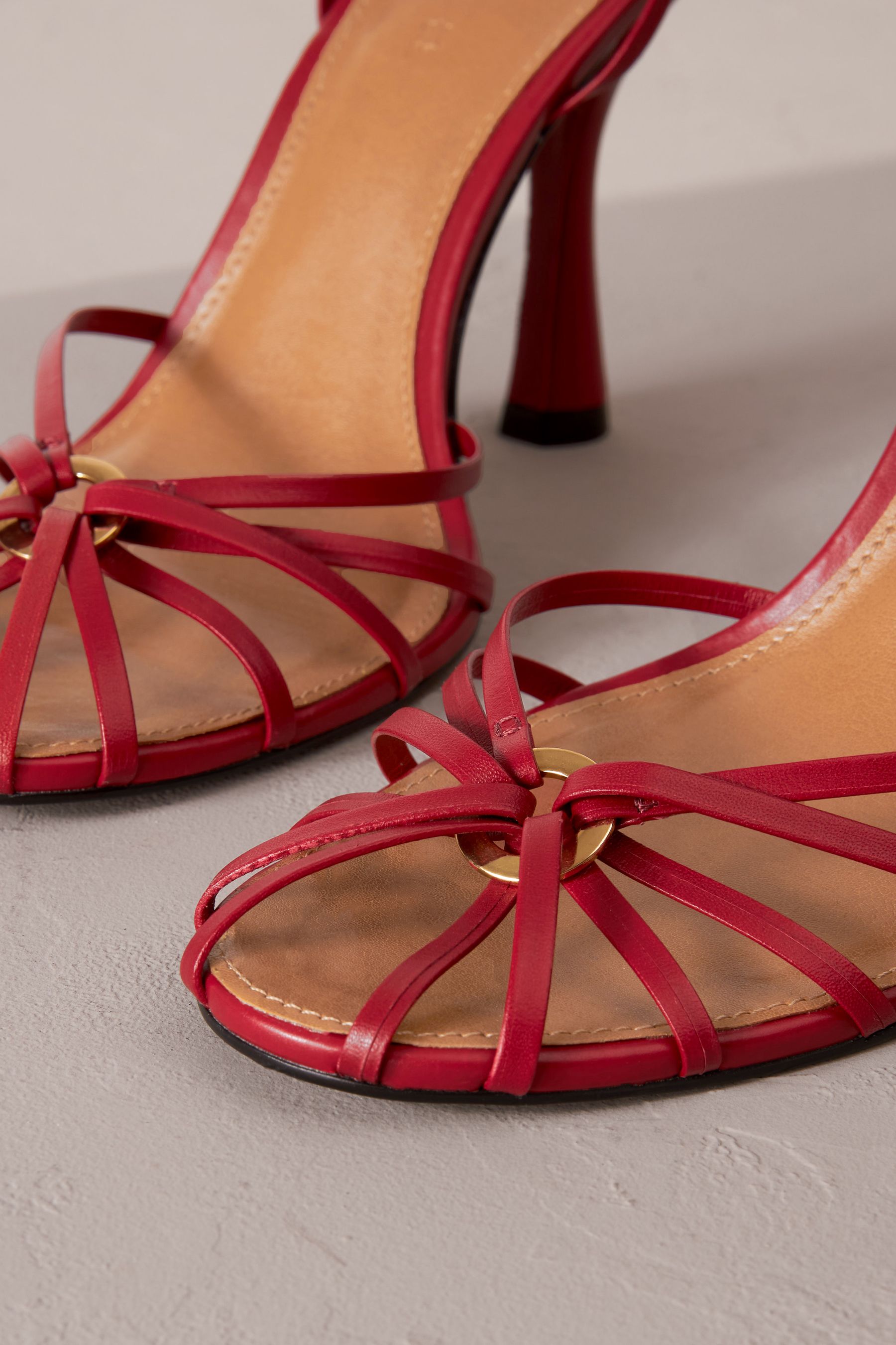 Red cage heels best sale