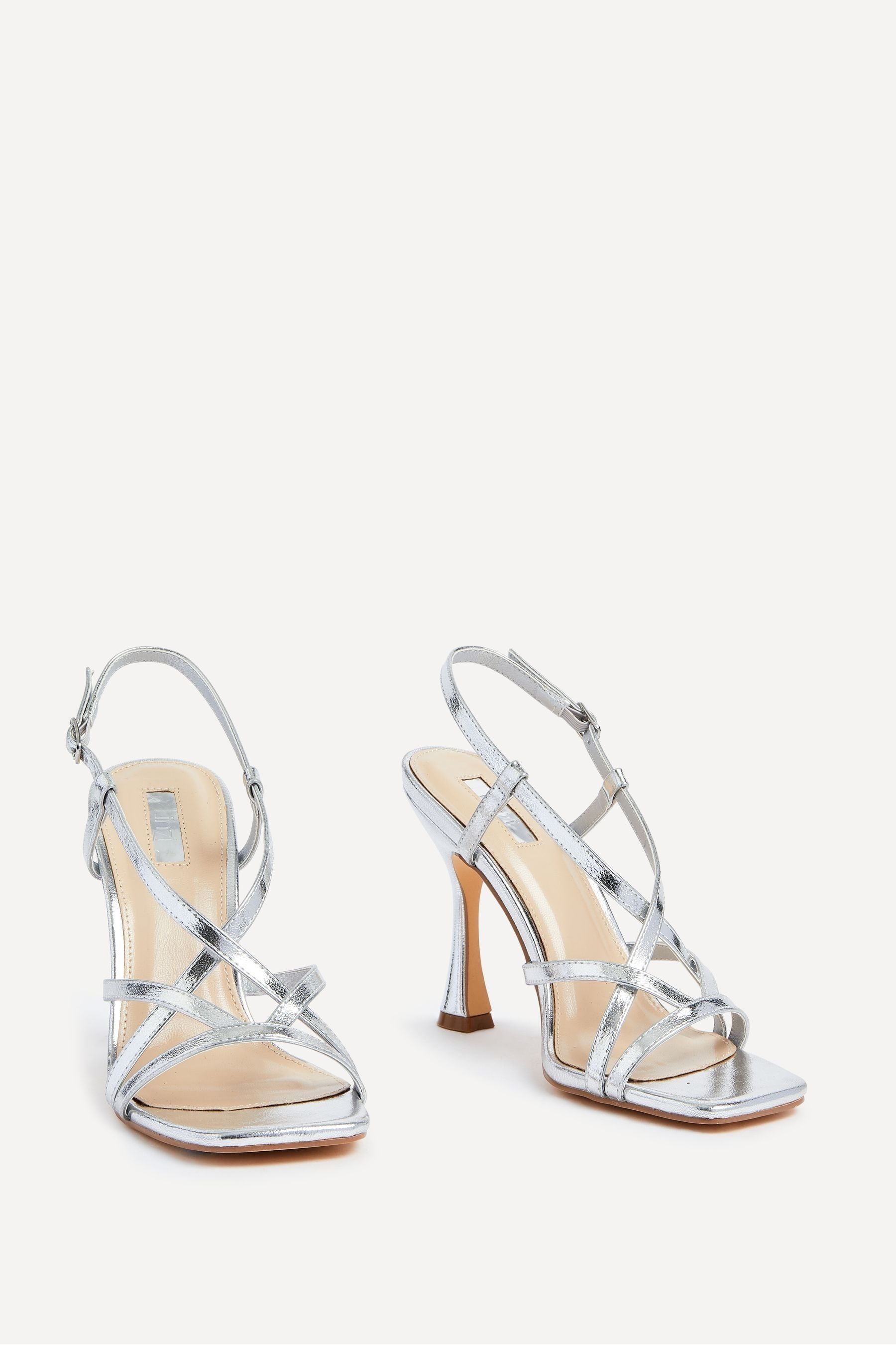 Strappy silver low best sale heels