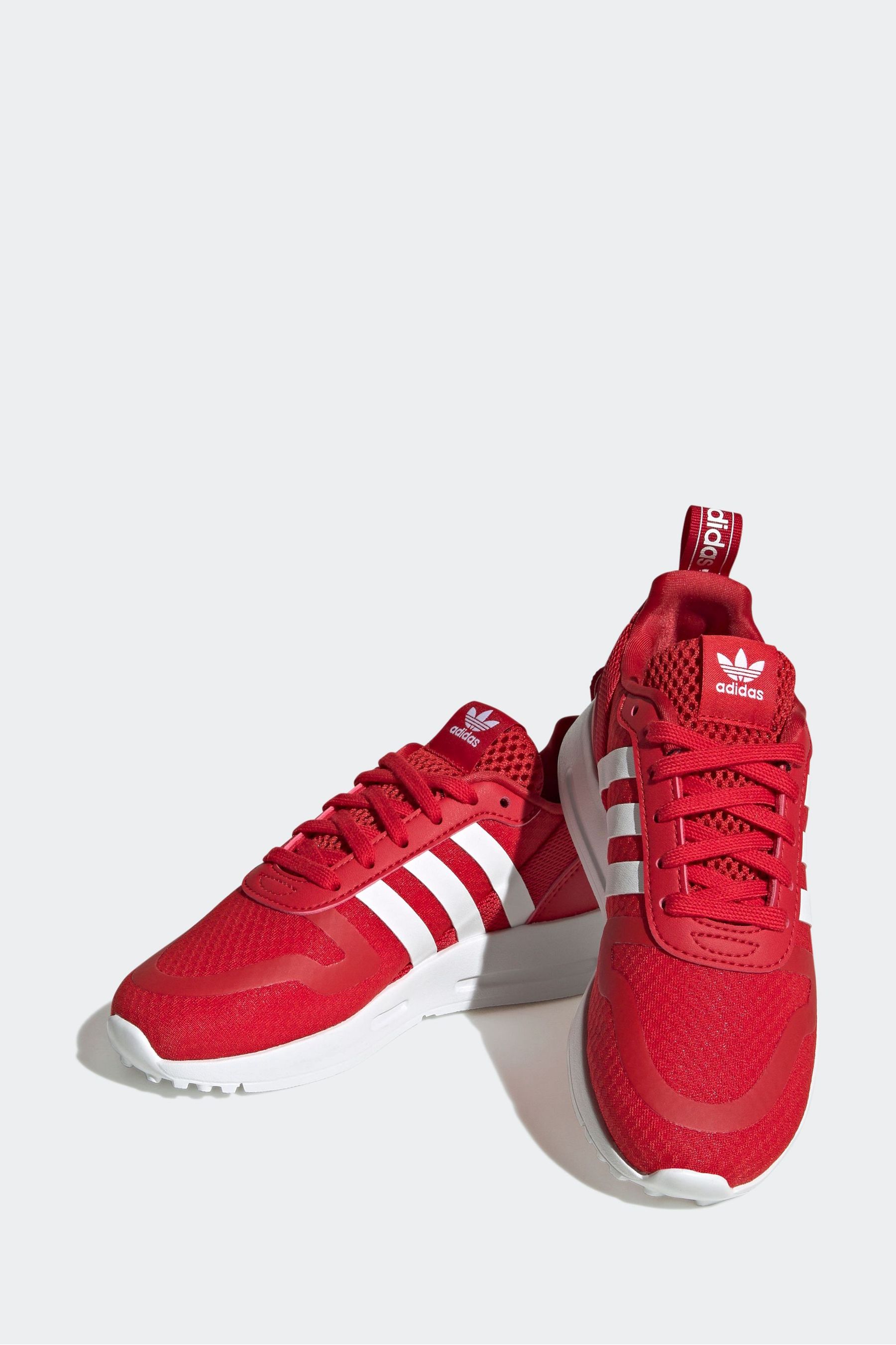 Childrens red 2025 adidas trainers