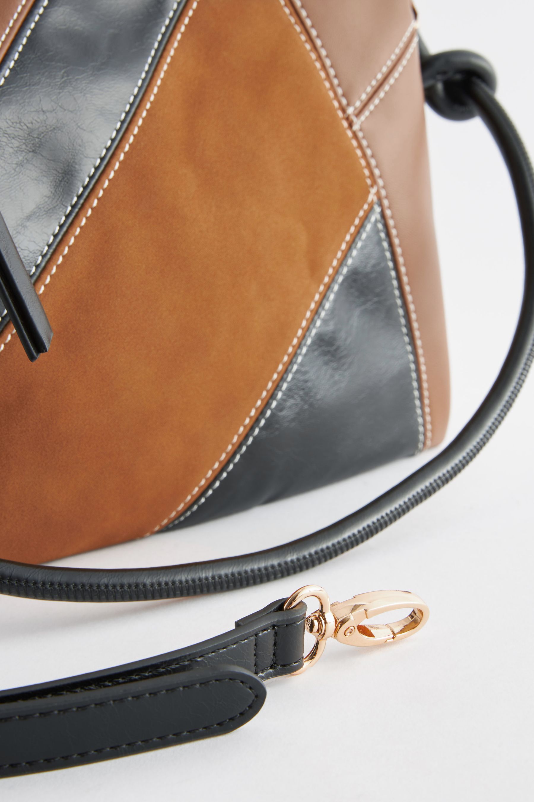 Light tan top cross body bag