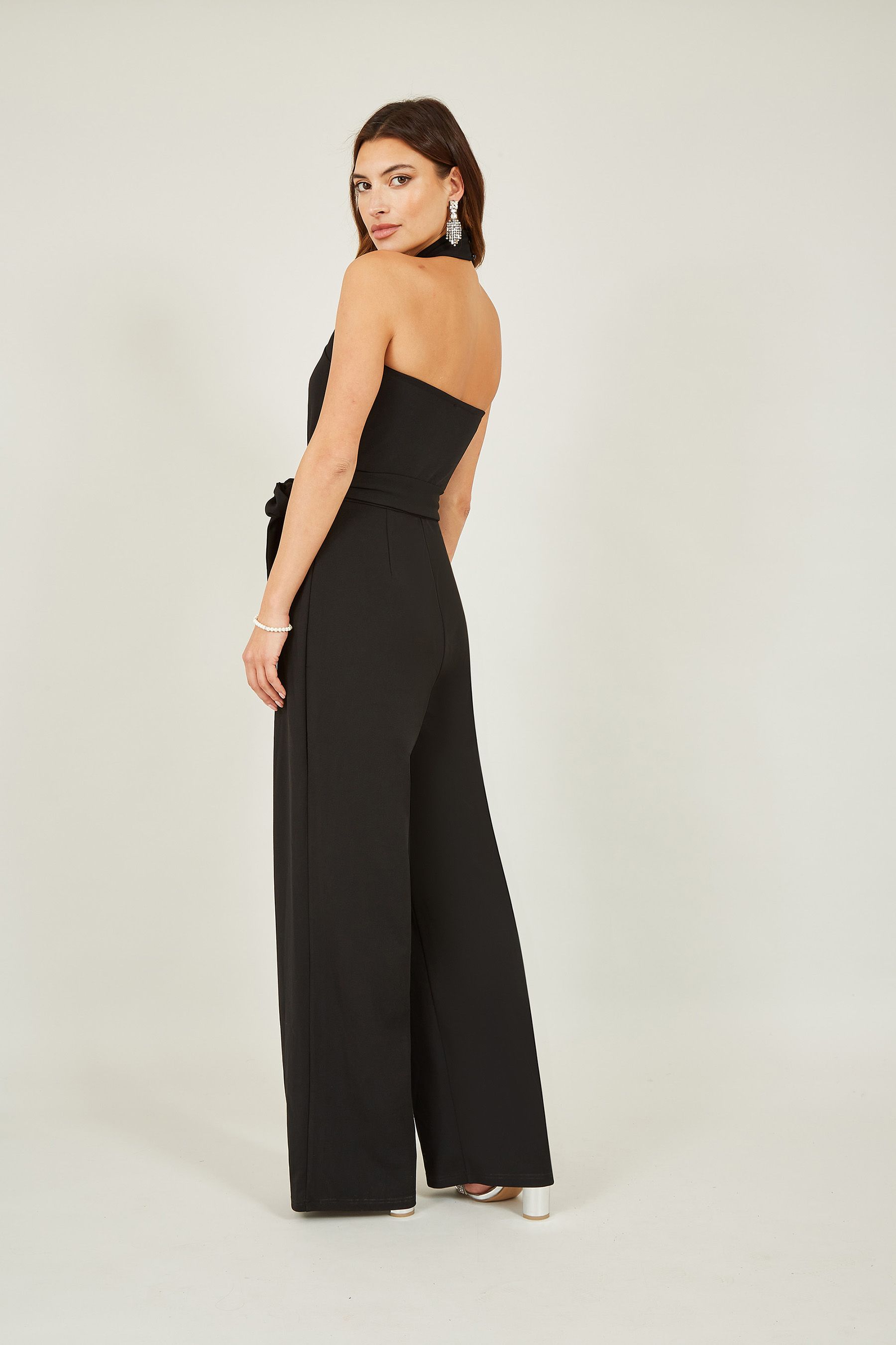 Buy Mela Black Cross Over Halter Neck Jumpsuit from the Next UK