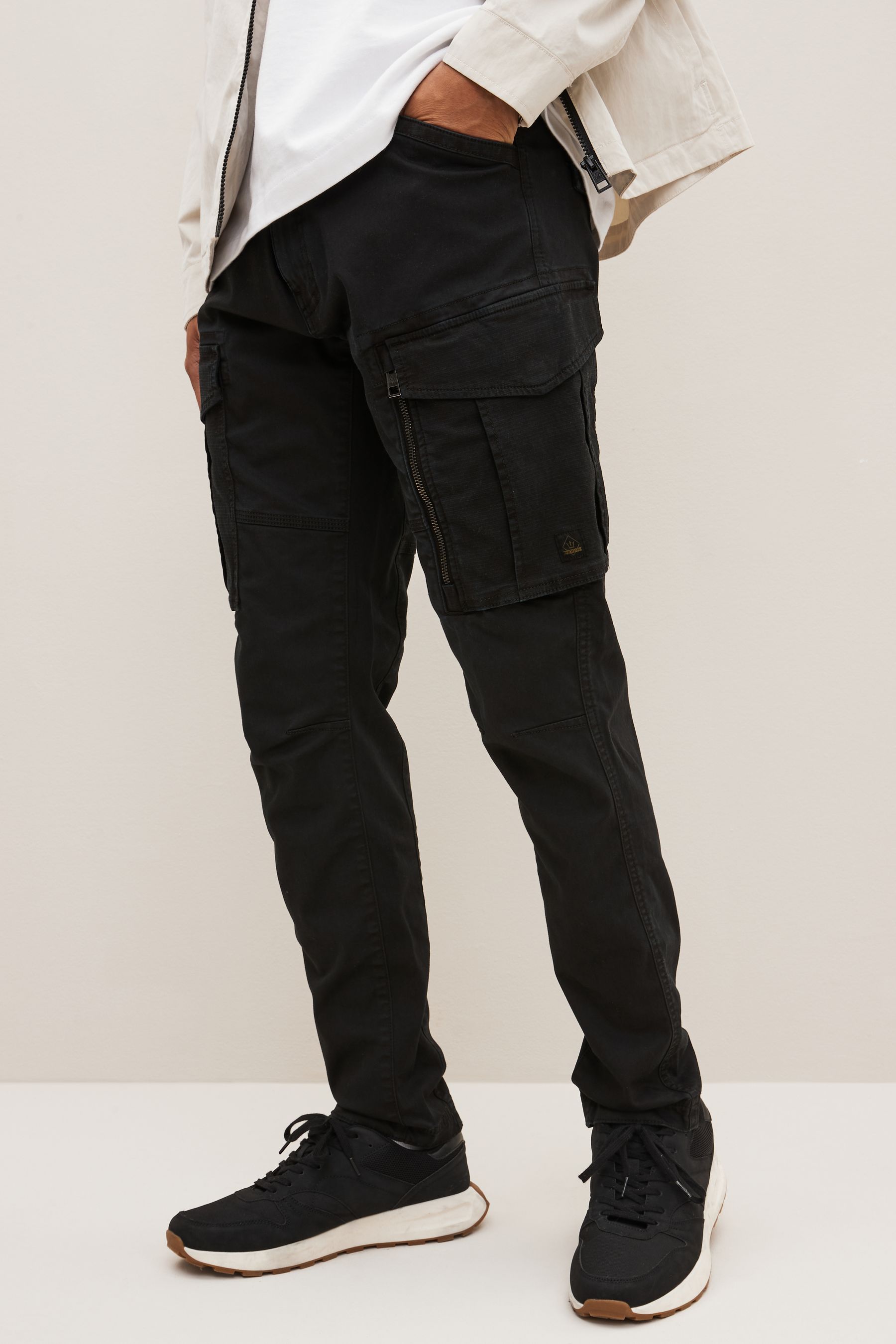 Buy Black Slim Fit Zip Detail Stretch Cargo Trousers from the Next UK online shop