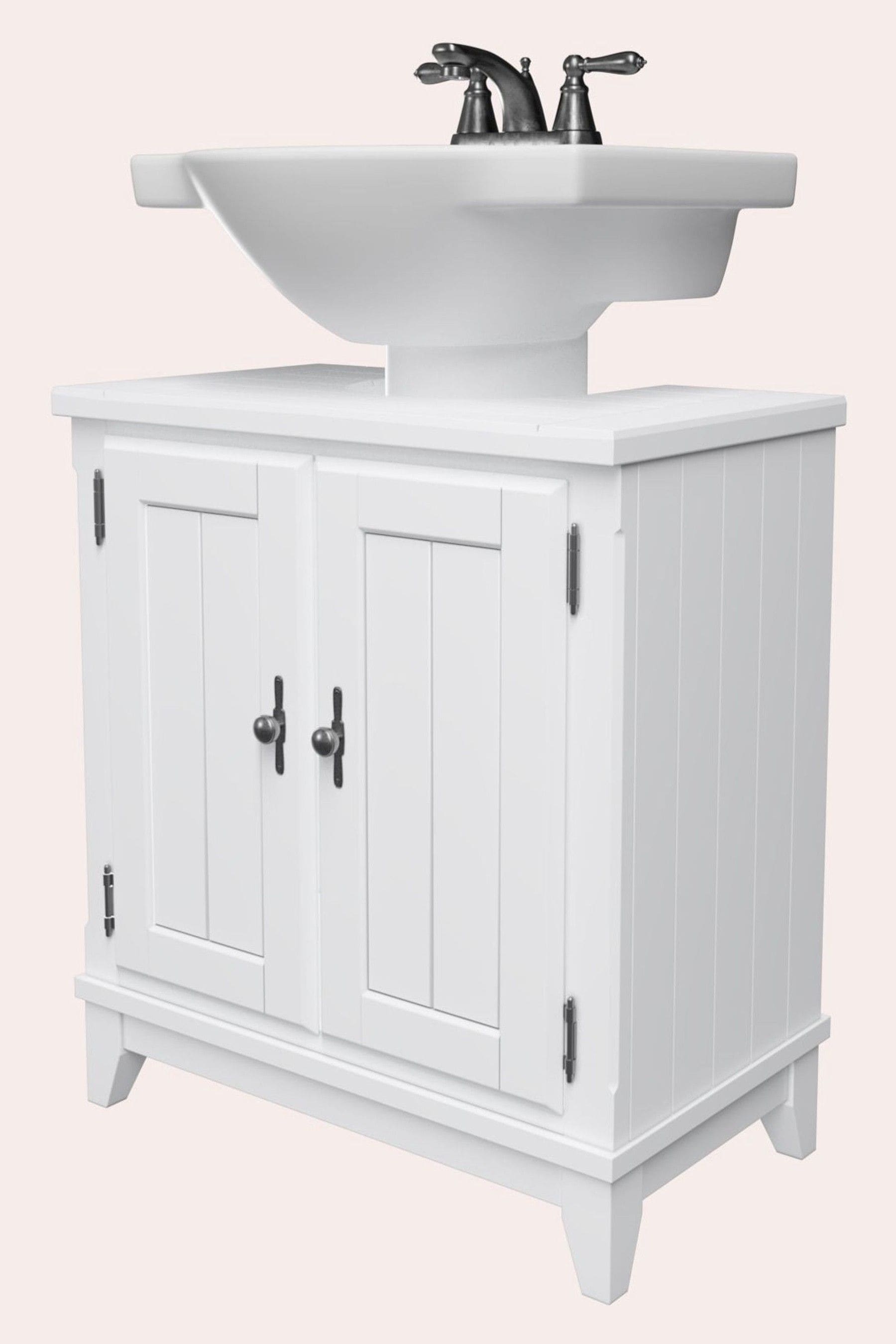 Pedestal sink outlet wrap cabinet