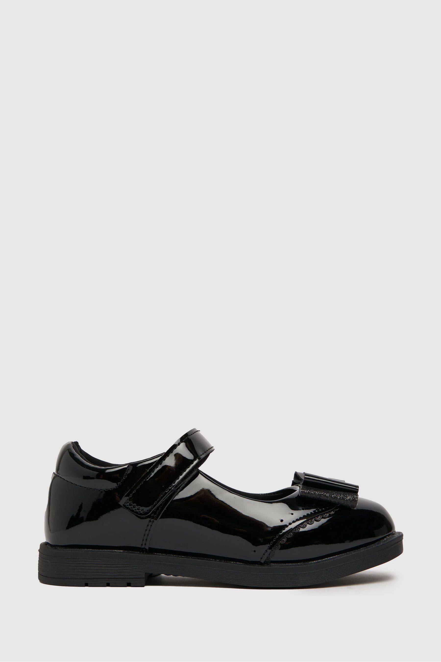 Black top bow sneakers