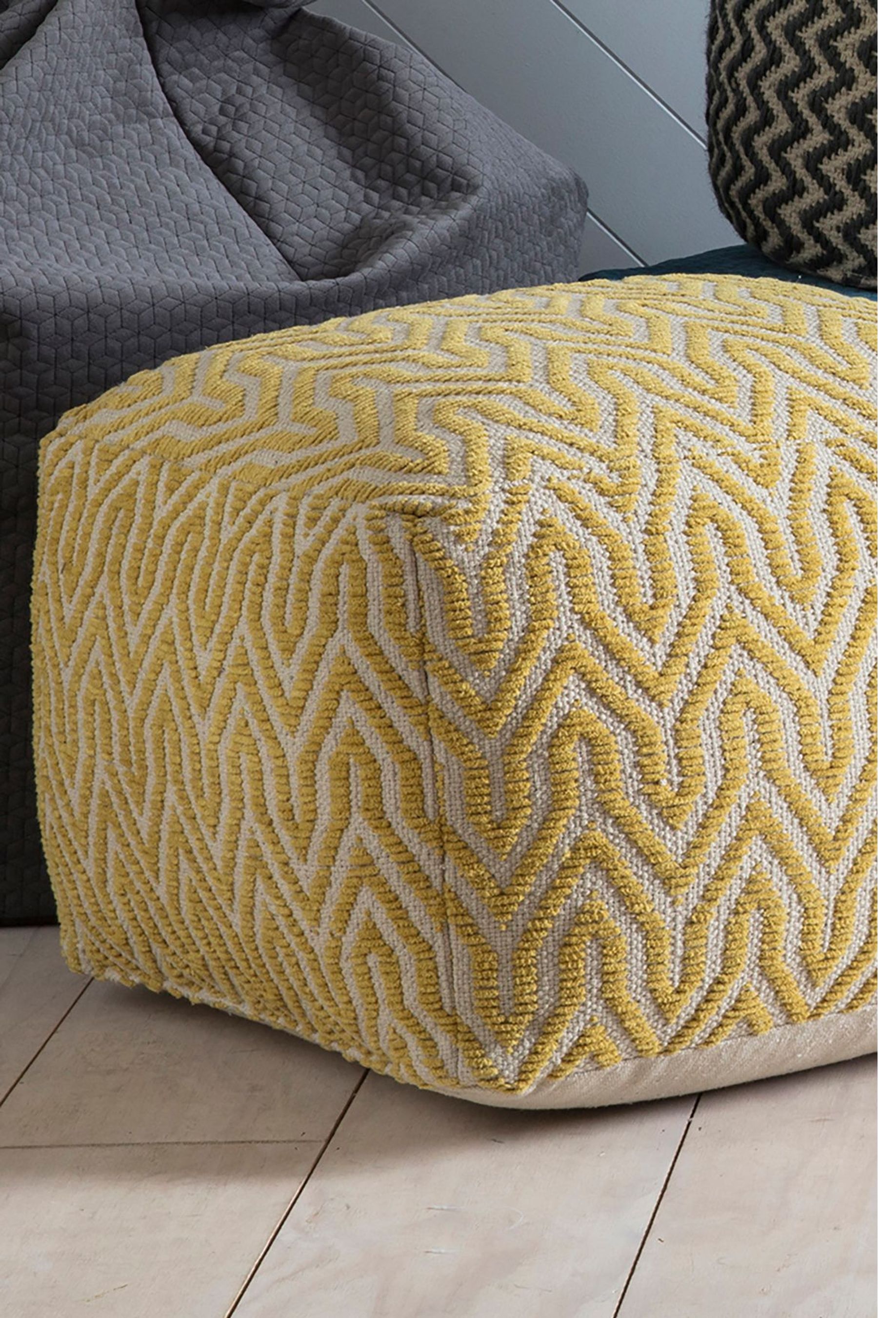 Yellow pouffe store